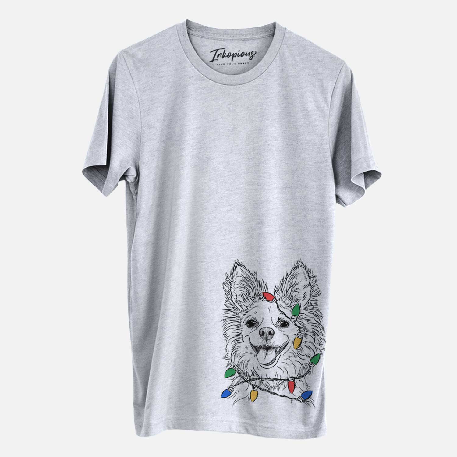 Hand-drawn sketch of Jasper the Pomchi wrapped in Christmas lights on a Grey Unisex crewneck