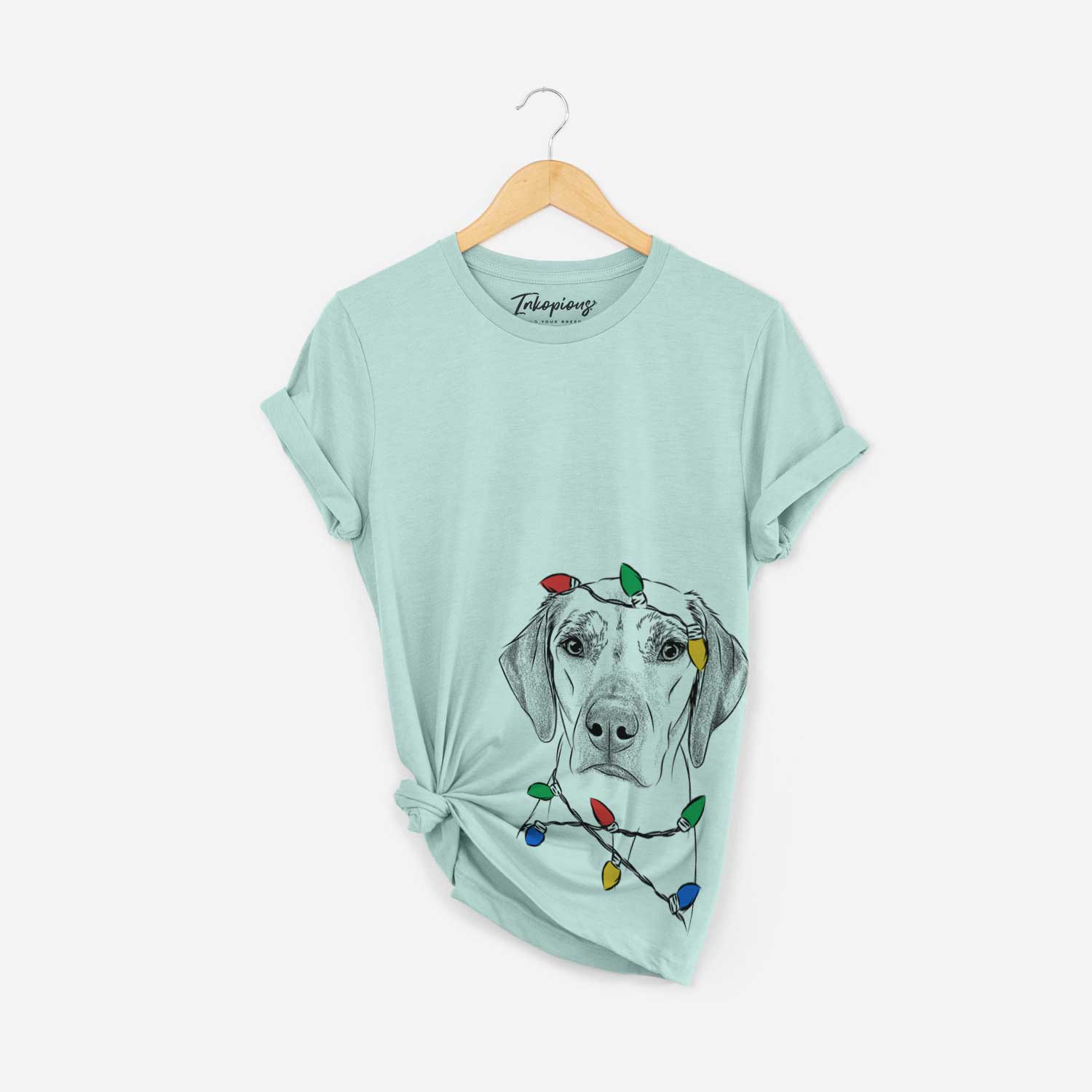 Hand-drawn sketch of Jenga the Rhodesian Ridgeback wrapped in Christmas lights on a Heather Sage Unisex crewneck