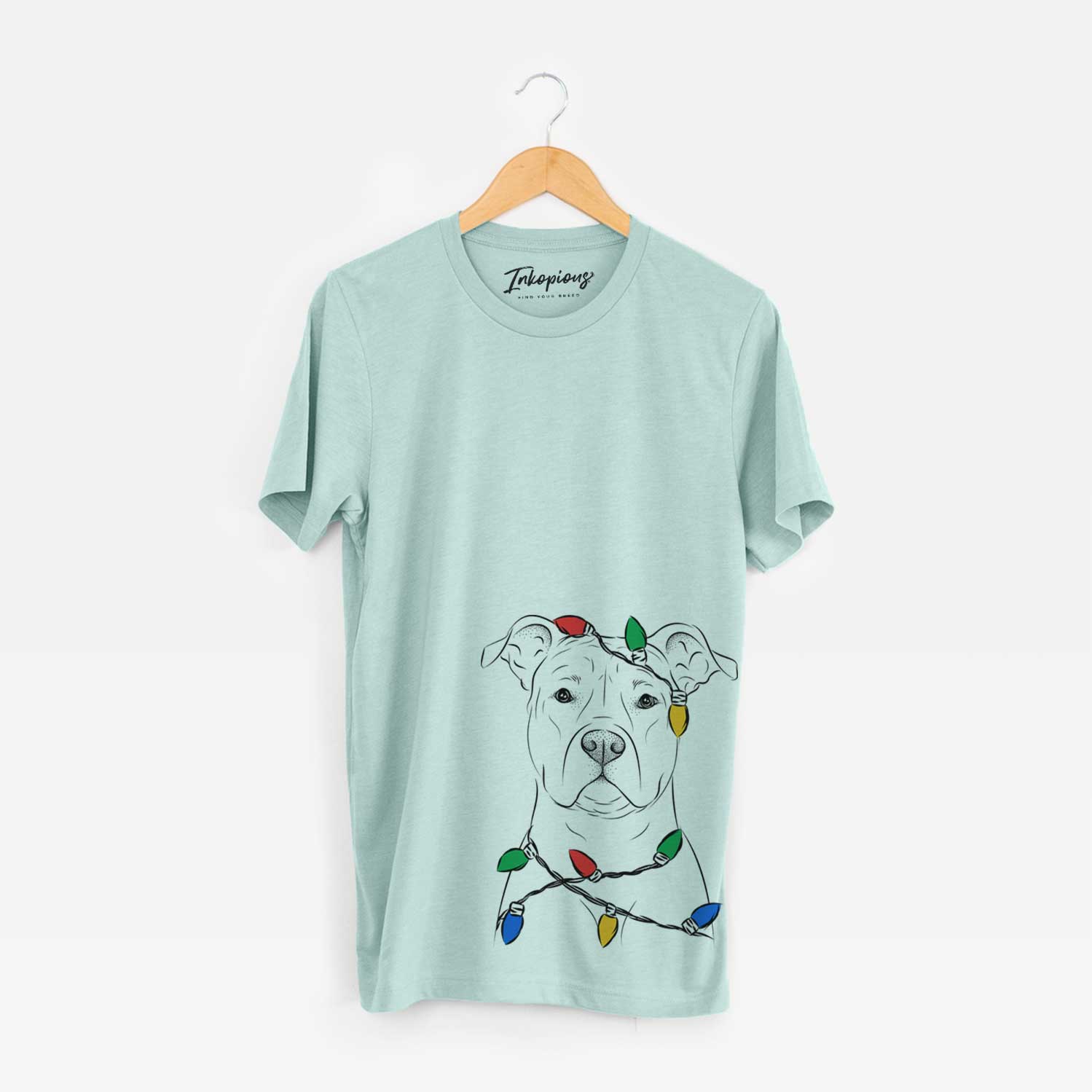 Hand-drawn sketch of Jethro the American Staffordshire Terrier wrapped in Christmas lights on a Heather Sage Unisex crewneck