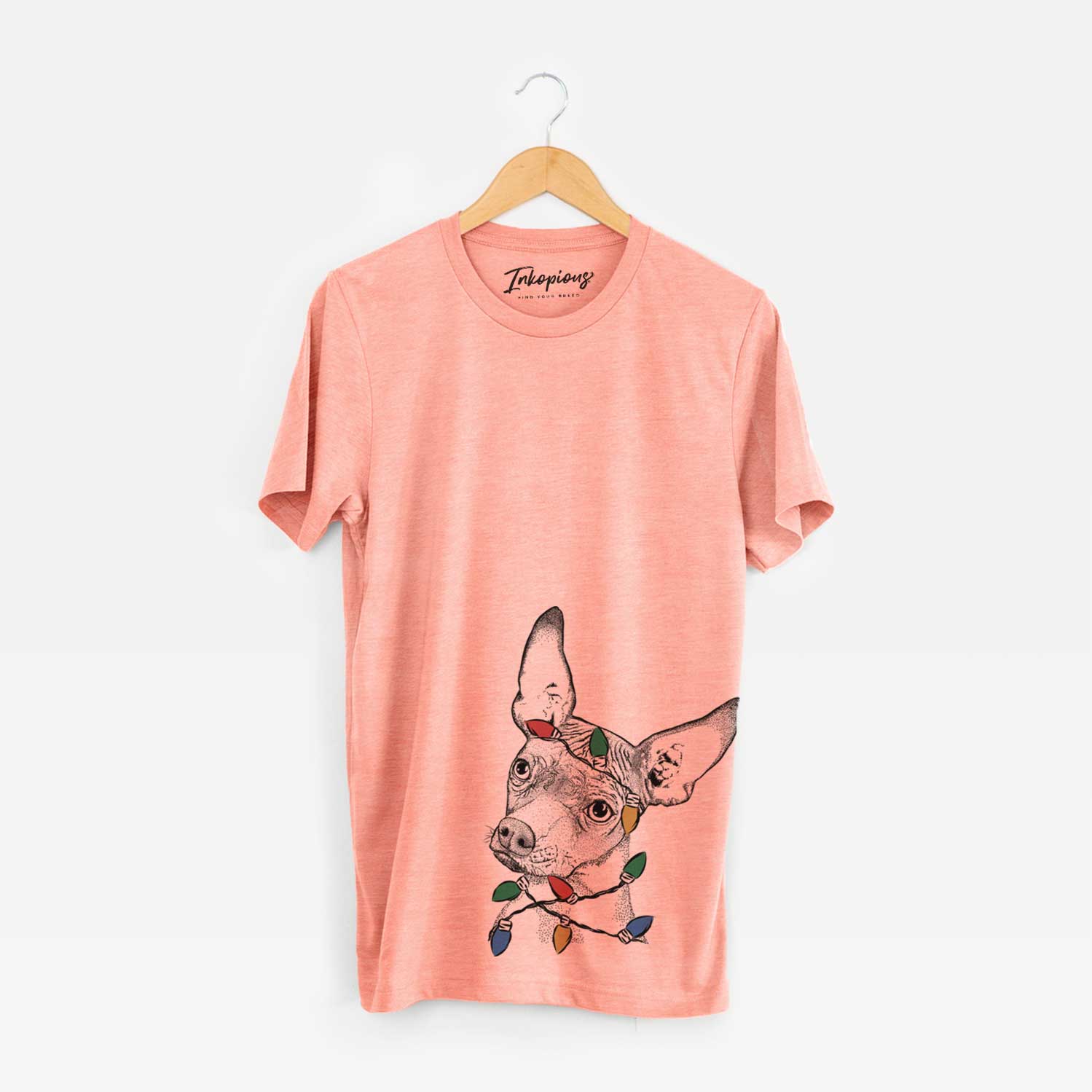 Hand-drawn sketch of Kahlo the Xoloitzcuintli wrapped in Christmas lights on a Sunset Unisex crewneck