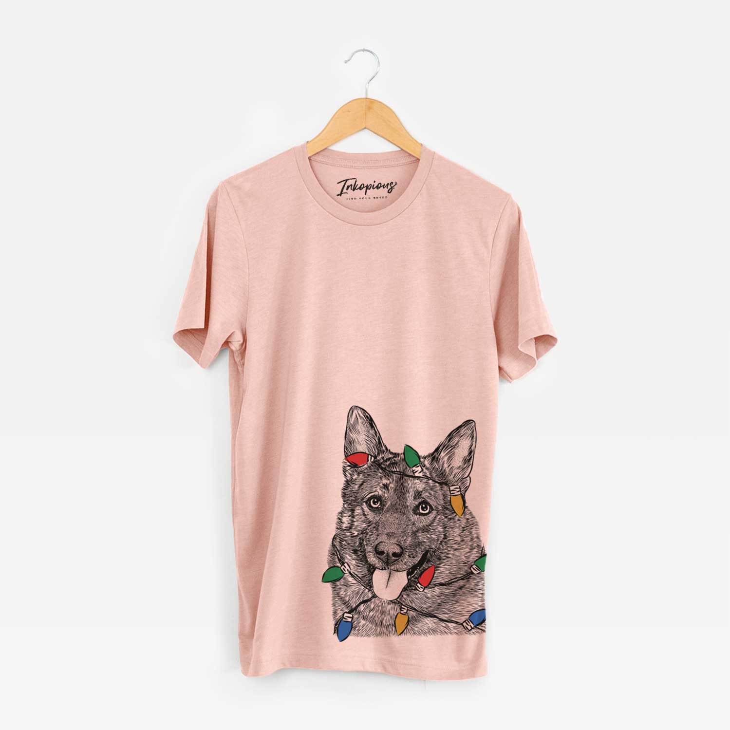 Hand-drawn sketch of Kasia the Norwegian Elkhound wrapped in Christmas lights on a Peach Unisex crewneck