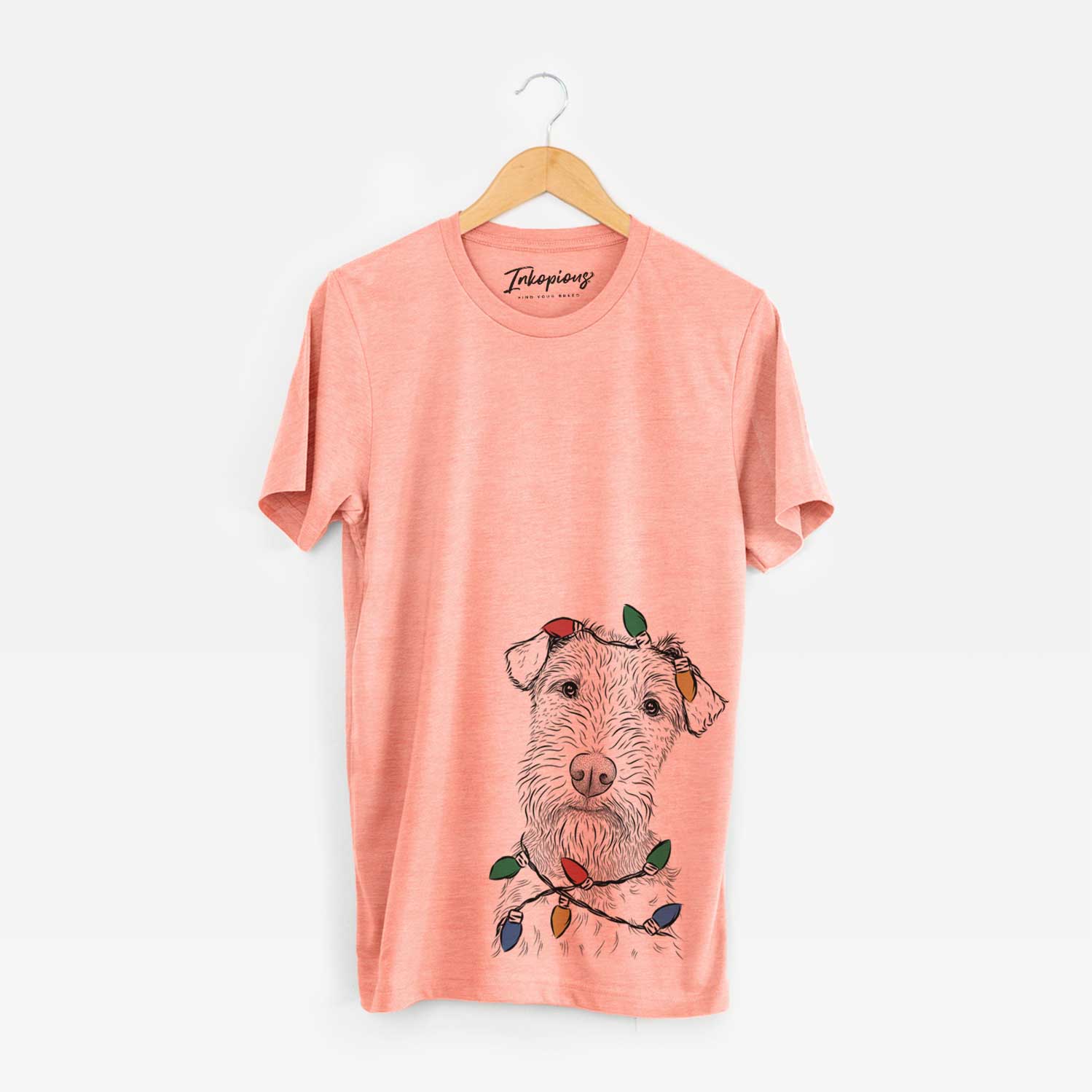 Hand-drawn sketch of Kiara the Welsh Terrier wrapped in Christmas lights on a Sunset Unisex crewneck