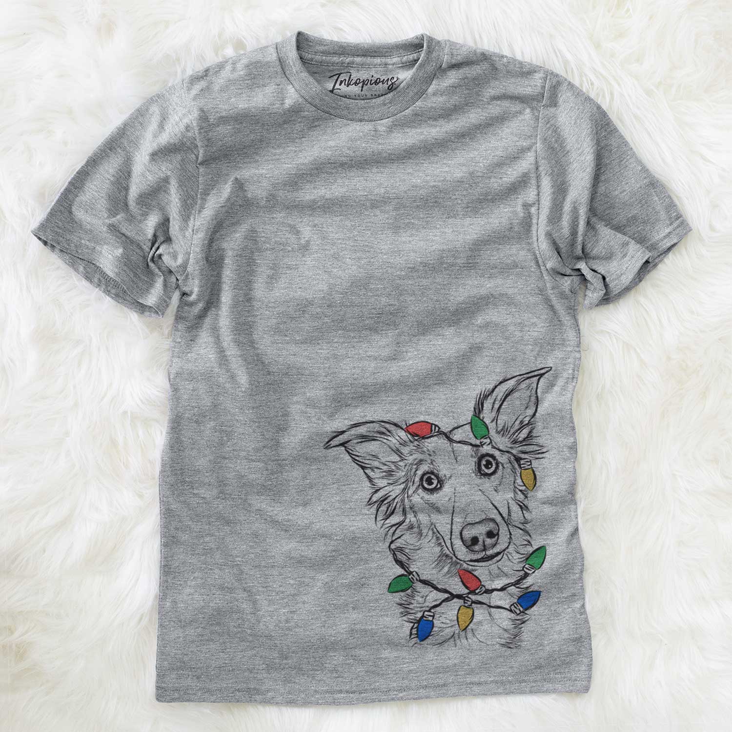 Hand-drawn sketch of Kyu the Windsprite wrapped in Christmas lights on a Grey Unisex crewneck