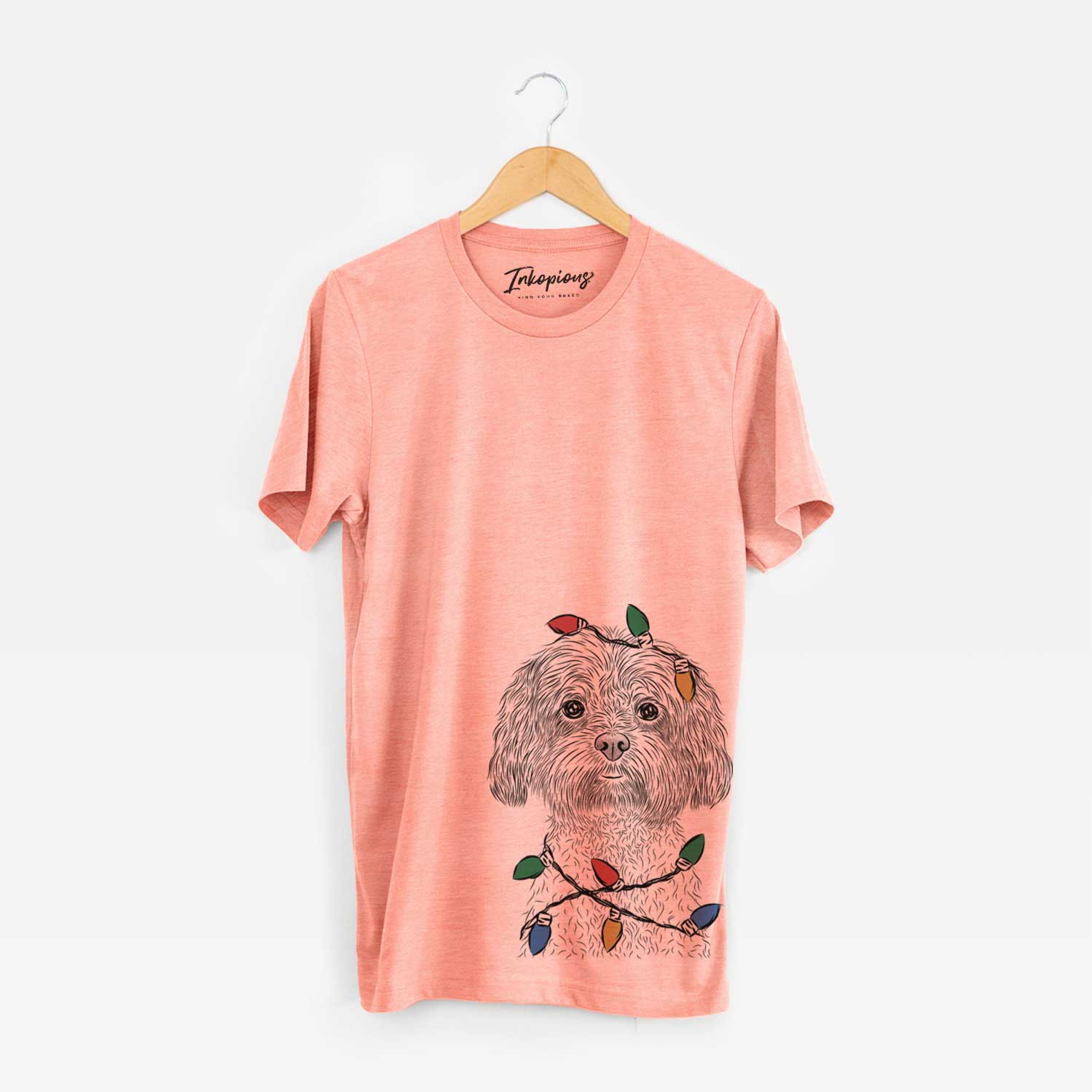 Hand-drawn sketch of Lane the Lhasa Apso wrapped in Christmas lights on a Sunset Unisex crewneck