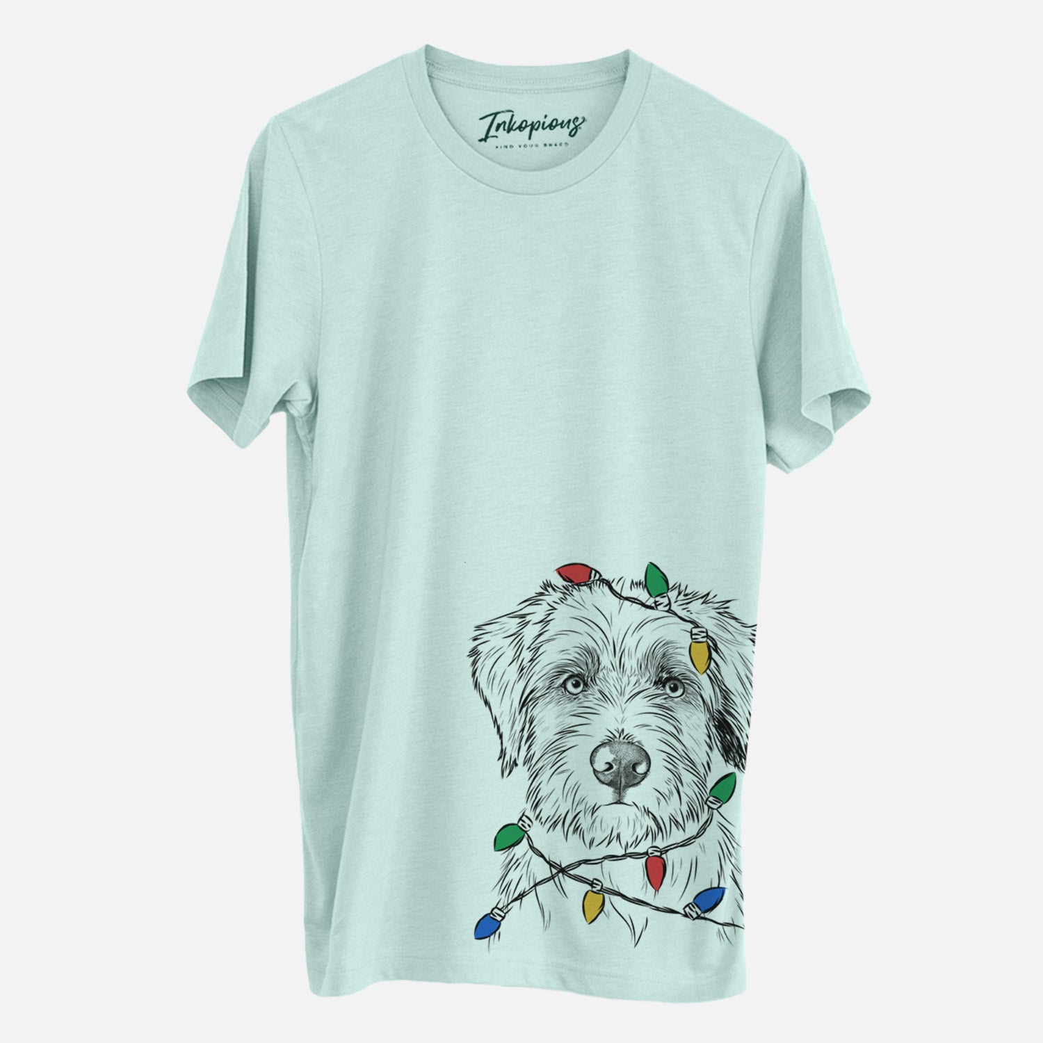 Hand-drawn sketch of Marek the Bernedoodle wrapped in Christmas lights on a Heather Sage Unisex crewneck