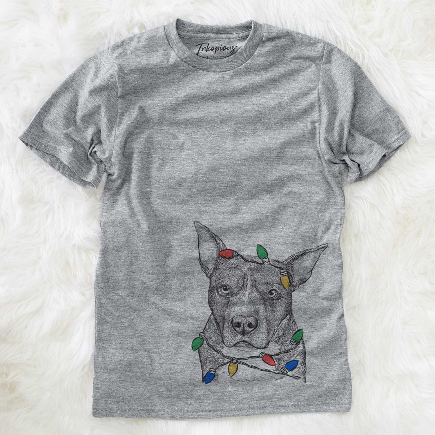 Hand-drawn sketch of Mercy the Pitbull wrapped in Christmas lights on a Grey Unisex crewneck