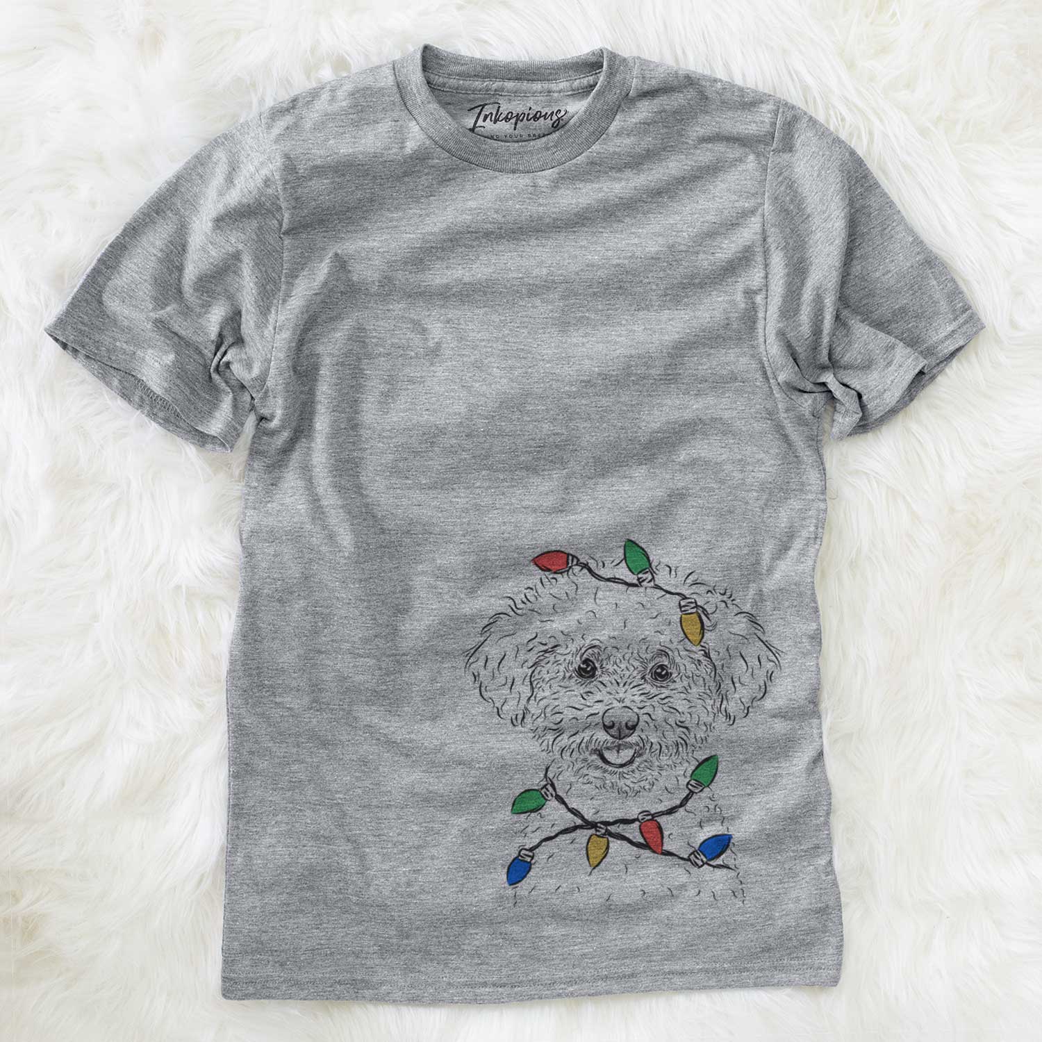 Hand-drawn sketch of Mickey the Bichon Frise wrapped in Christmas lights on a Grey Unisex crewneck