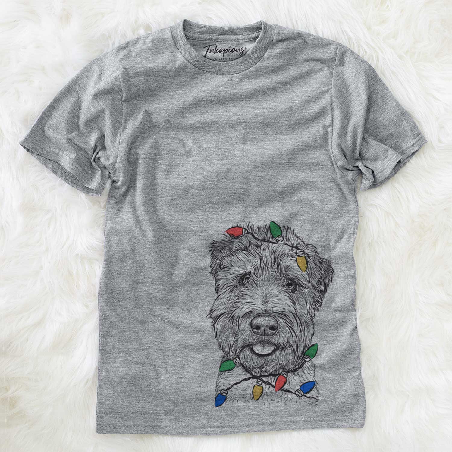 Hand-drawn sketch of Milton the Soft Coated Wheaten Terrier wrapped in Christmas lights on a Grey Unisex crewneck
