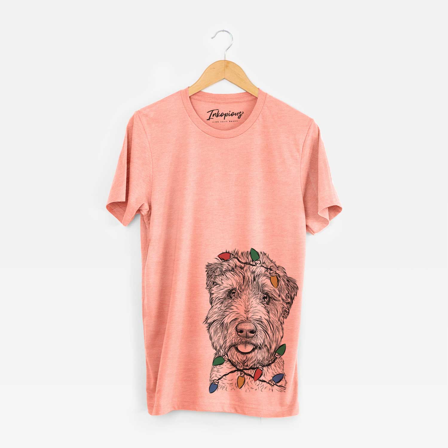 Hand-drawn sketch of Milton the Soft Coated Wheaten Terrier wrapped in Christmas lights on a Sunset Unisex crewneck