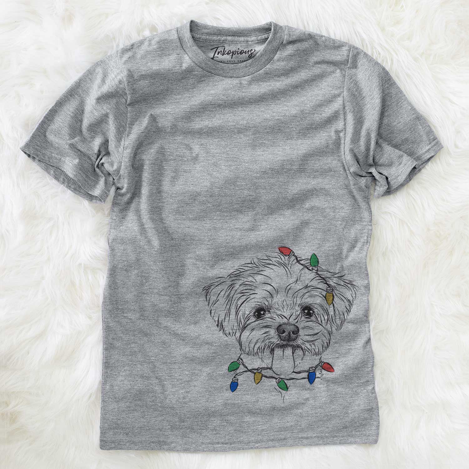Hand-drawn sketch of Mochi the Maltese wrapped in Christmas lights on a Grey Unisex crewneck