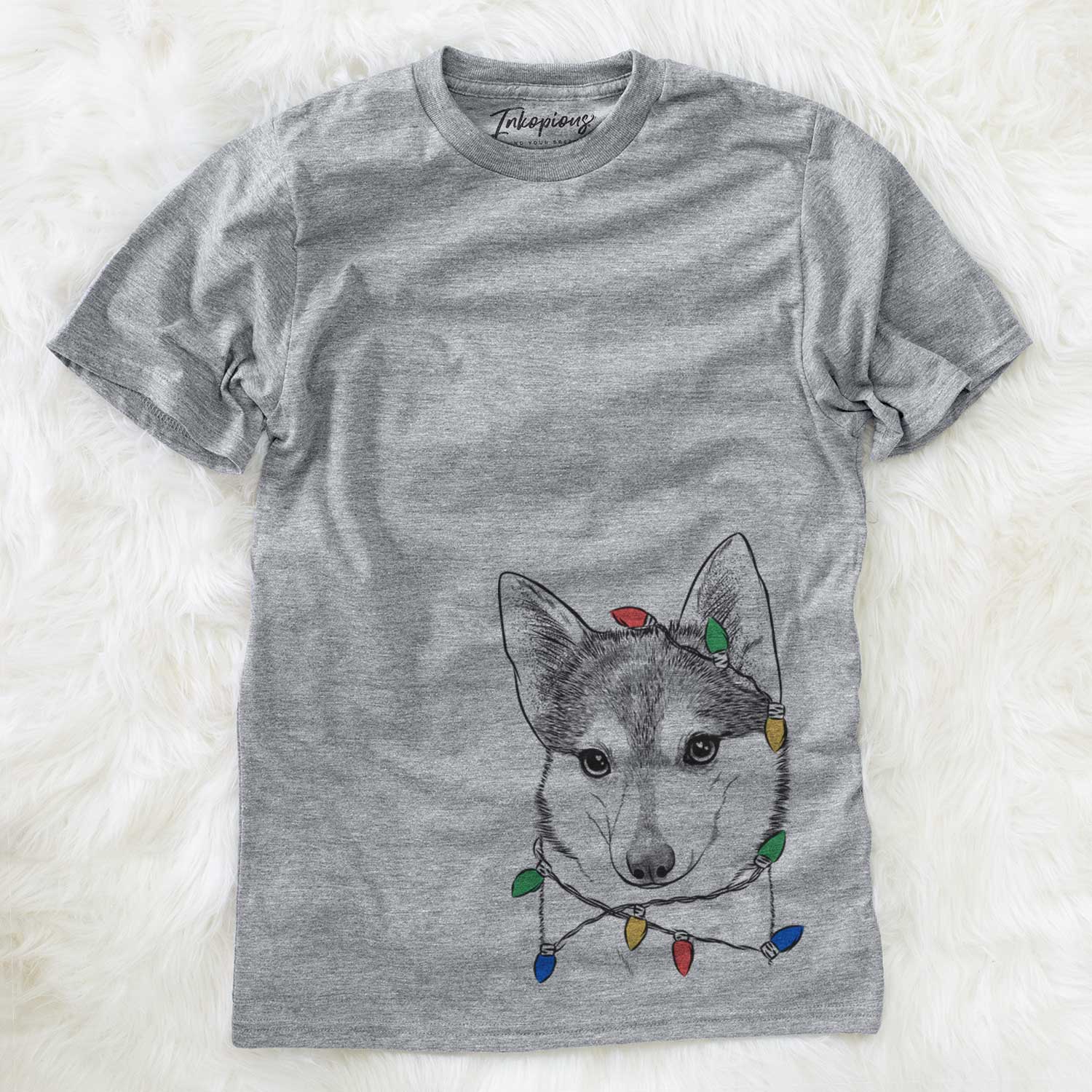 Hand-drawn sketch of Nami the Alaskan Klee Kai wrapped in Christmas lights on a Grey Unisex crewneck