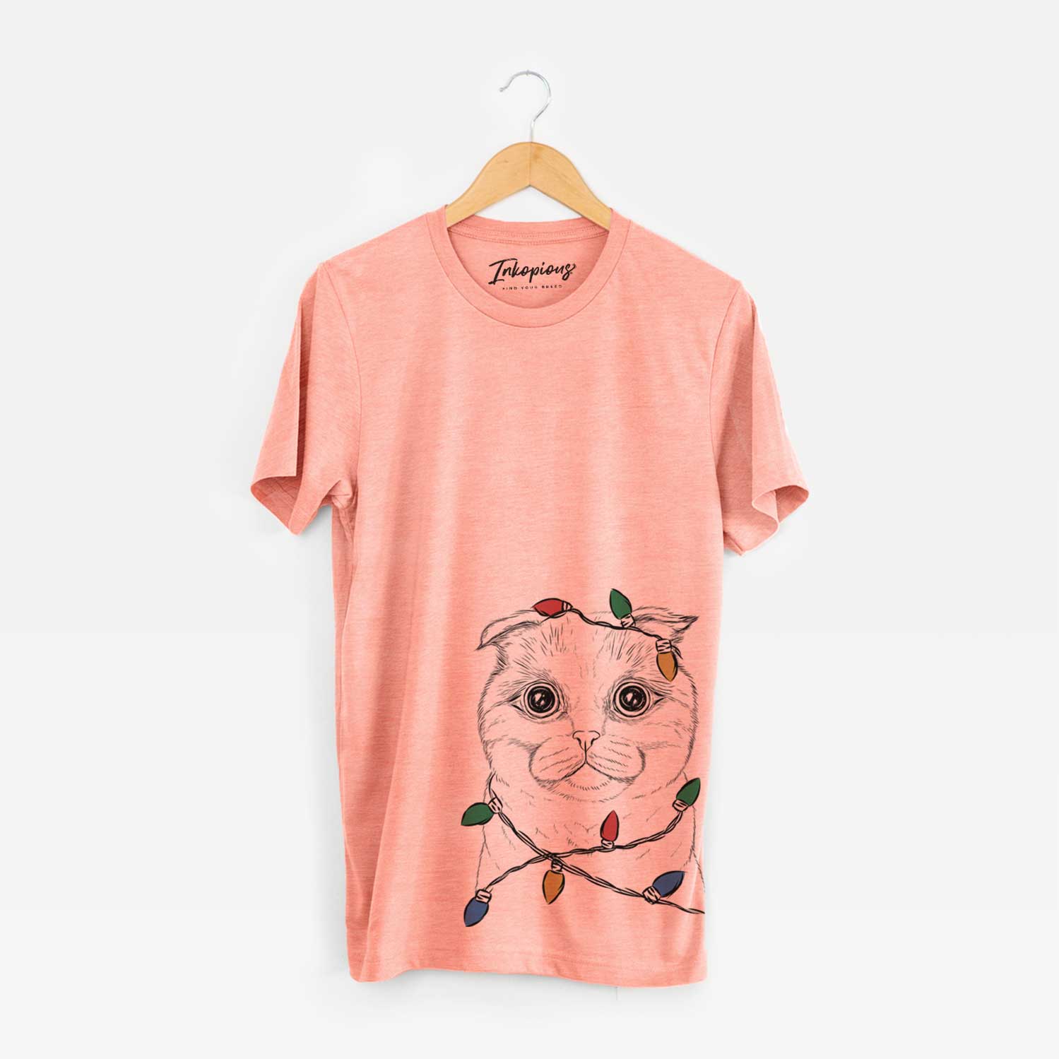 Hand-drawn sketch of Neko the Scottish Fold Cat wrapped in Christmas lights on a Sunset Unisex crewneck