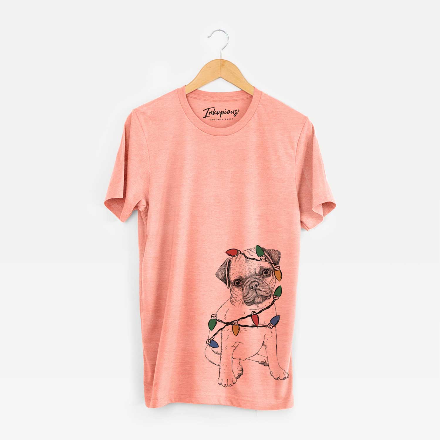 Hand-drawn sketch of Nelson the Pug Puppy wrapped in Christmas lights on a Sunset Unisex crewneck