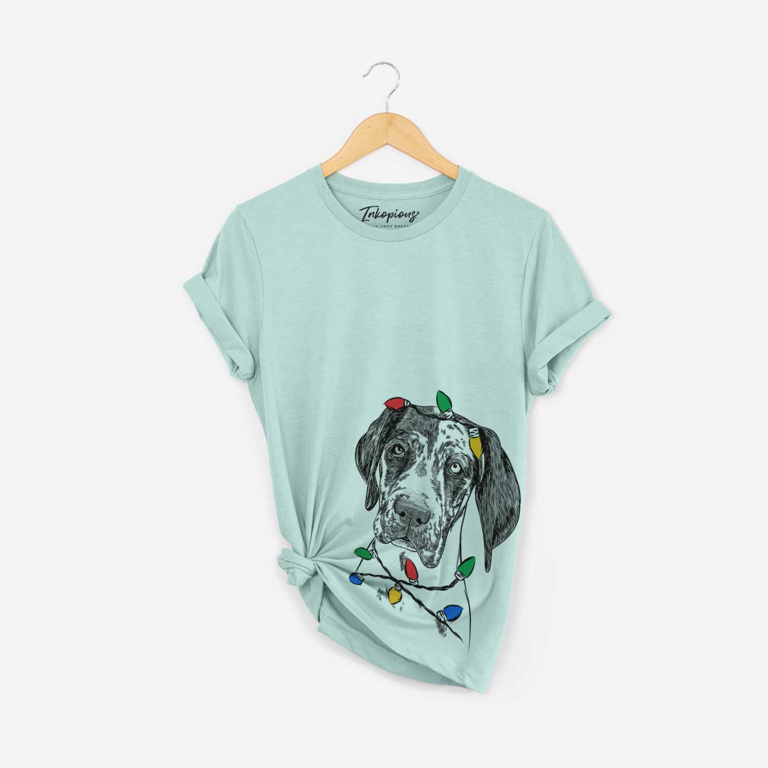 Hand-drawn sketch of Nyx the Great Dane wrapped in Christmas lights on a Heather Sage Unisex crewneck