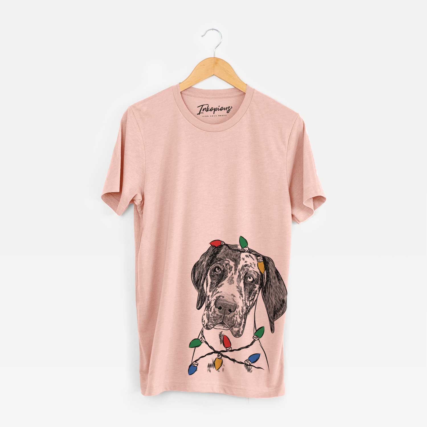 Hand-drawn sketch of Nyx the Great Dane wrapped in Christmas lights on a Peach Unisex crewneck