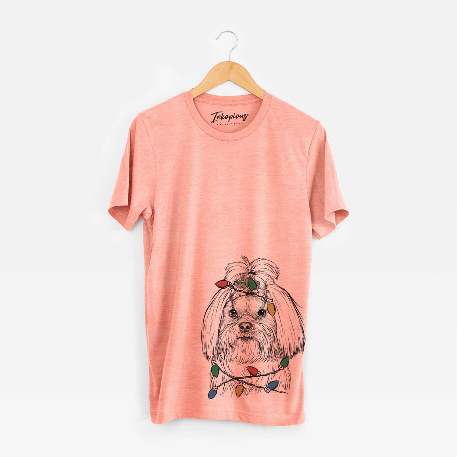 Hand-drawn sketch of Olga the Shih Tzu wrapped in Christmas lights on a Sunset Unisex crewneck