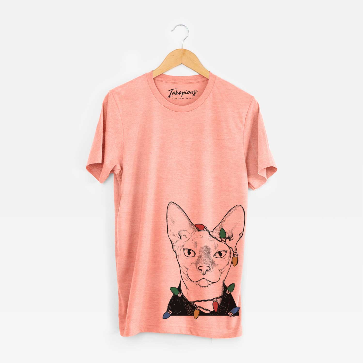 Hand-drawn sketch of Oliver Watson the Sphynx Cat wrapped in Christmas lights on a Sunset Unisex crewneck