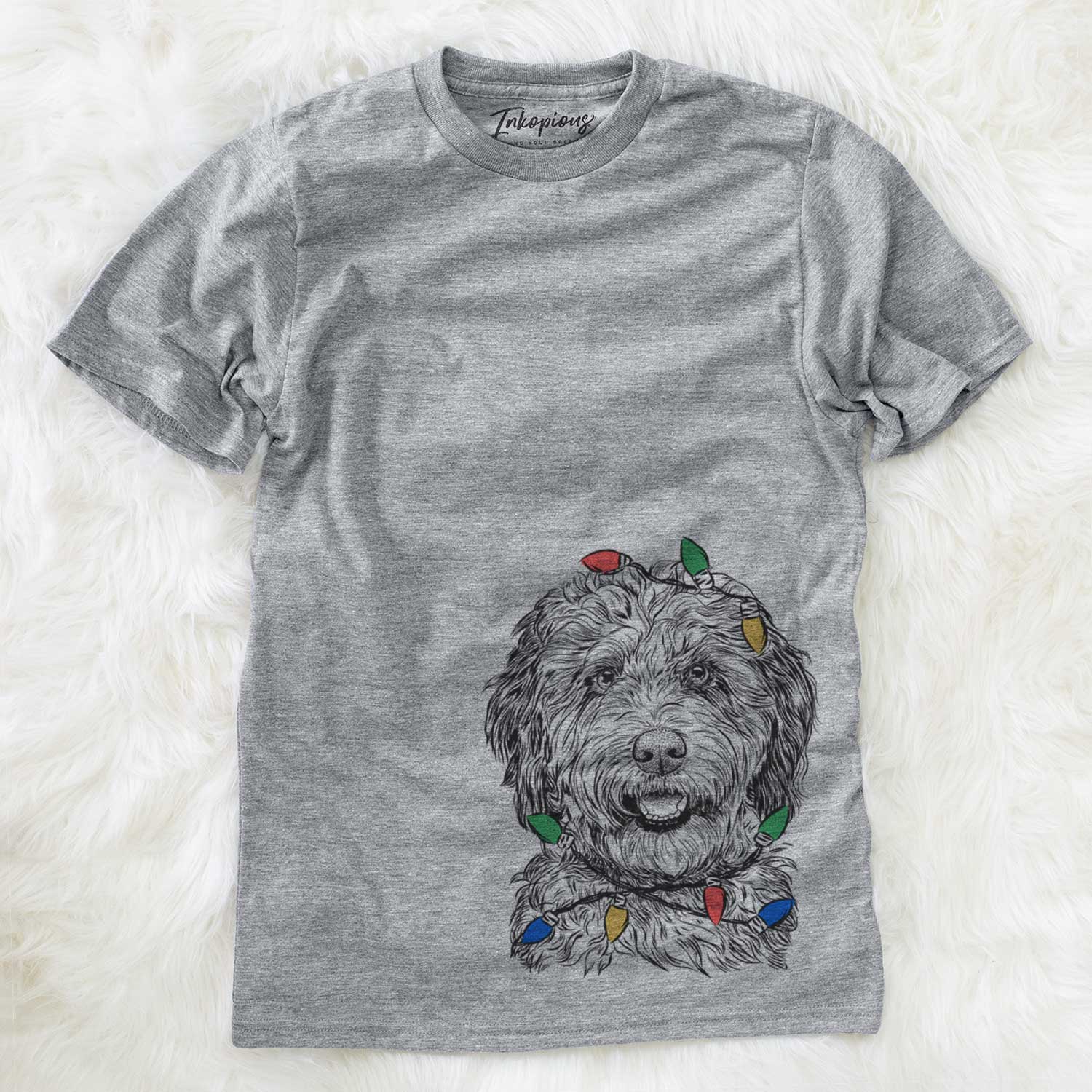 Hand-drawn sketch of Palmer the Aussiedoodle wrapped in Christmas lights on a Grey Unisex crewneck