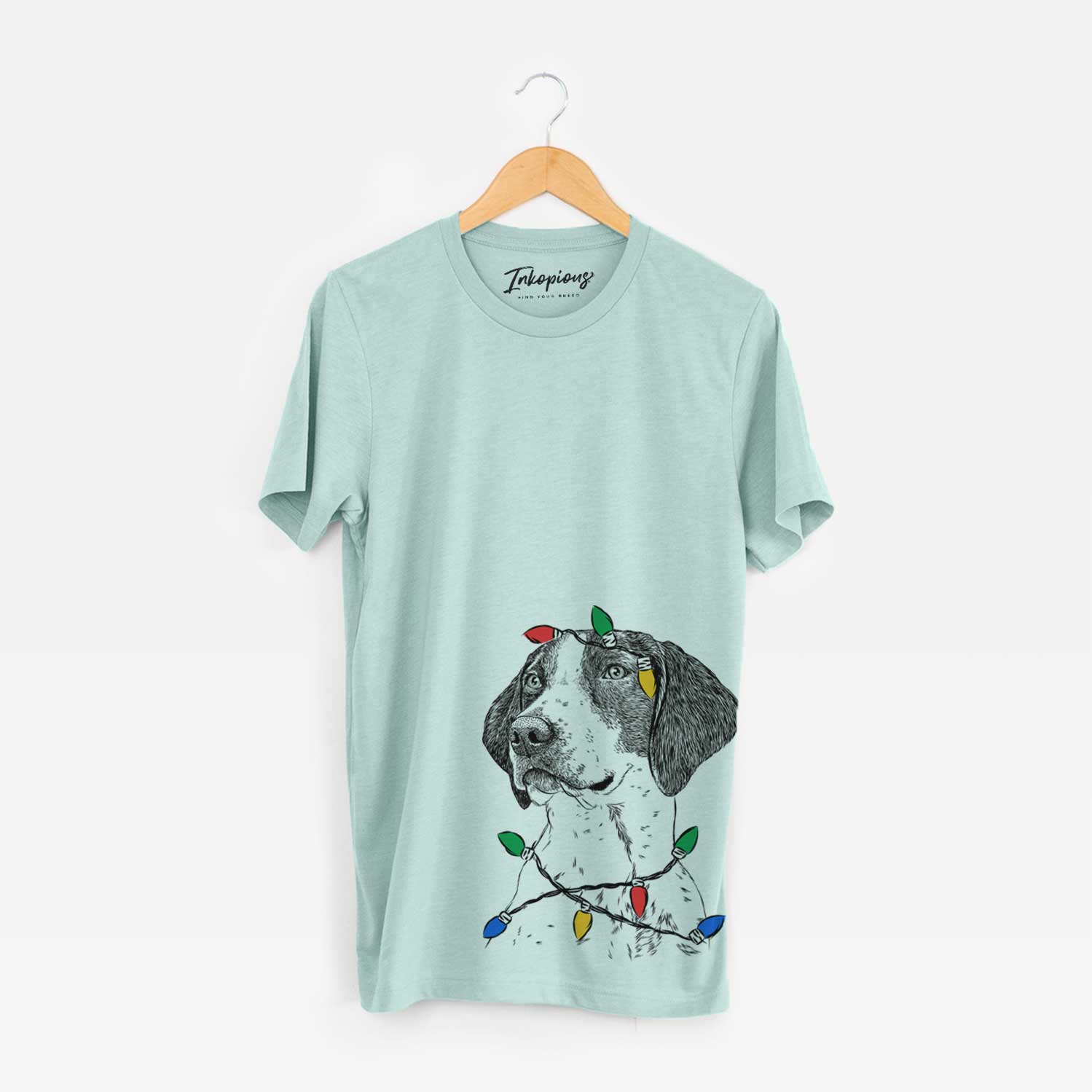 Hand-drawn sketch of Payton the Mixed Breed wrapped in Christmas lights on a Heather Sage Unisex crewneck