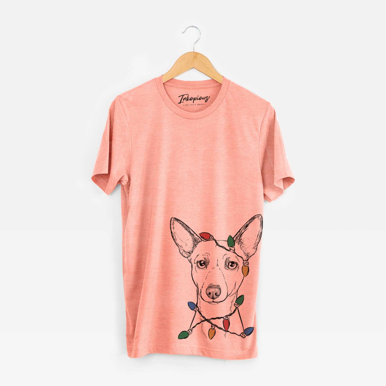 Hand-drawn sketch of Perry the Portuguese Podengo wrapped in Christmas lights on a Sunset Unisex crewneck