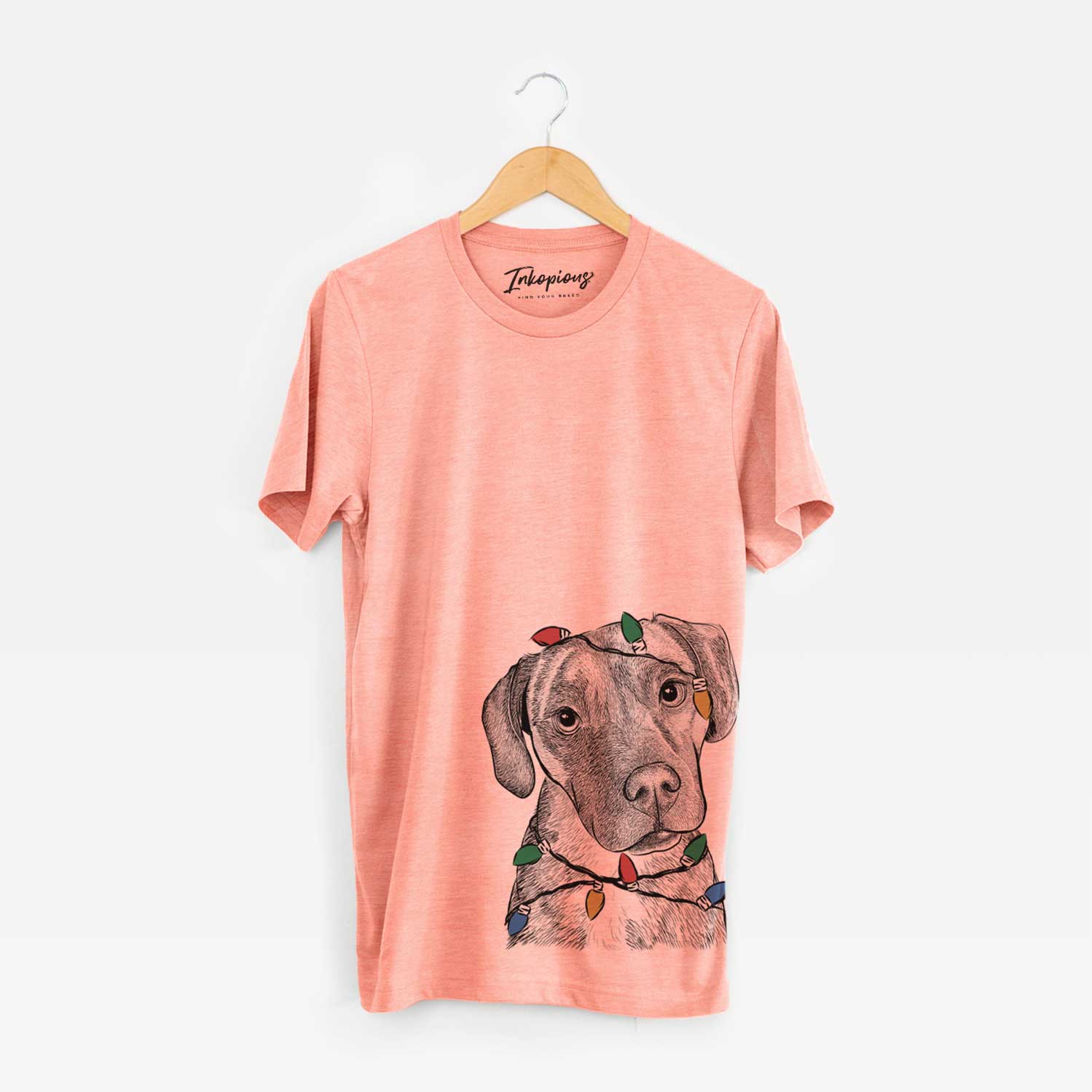 Hand-drawn sketch of Peyton Manning the Beagle Bulldog Mix wrapped in Christmas lights on a Sunset Unisex crewneck