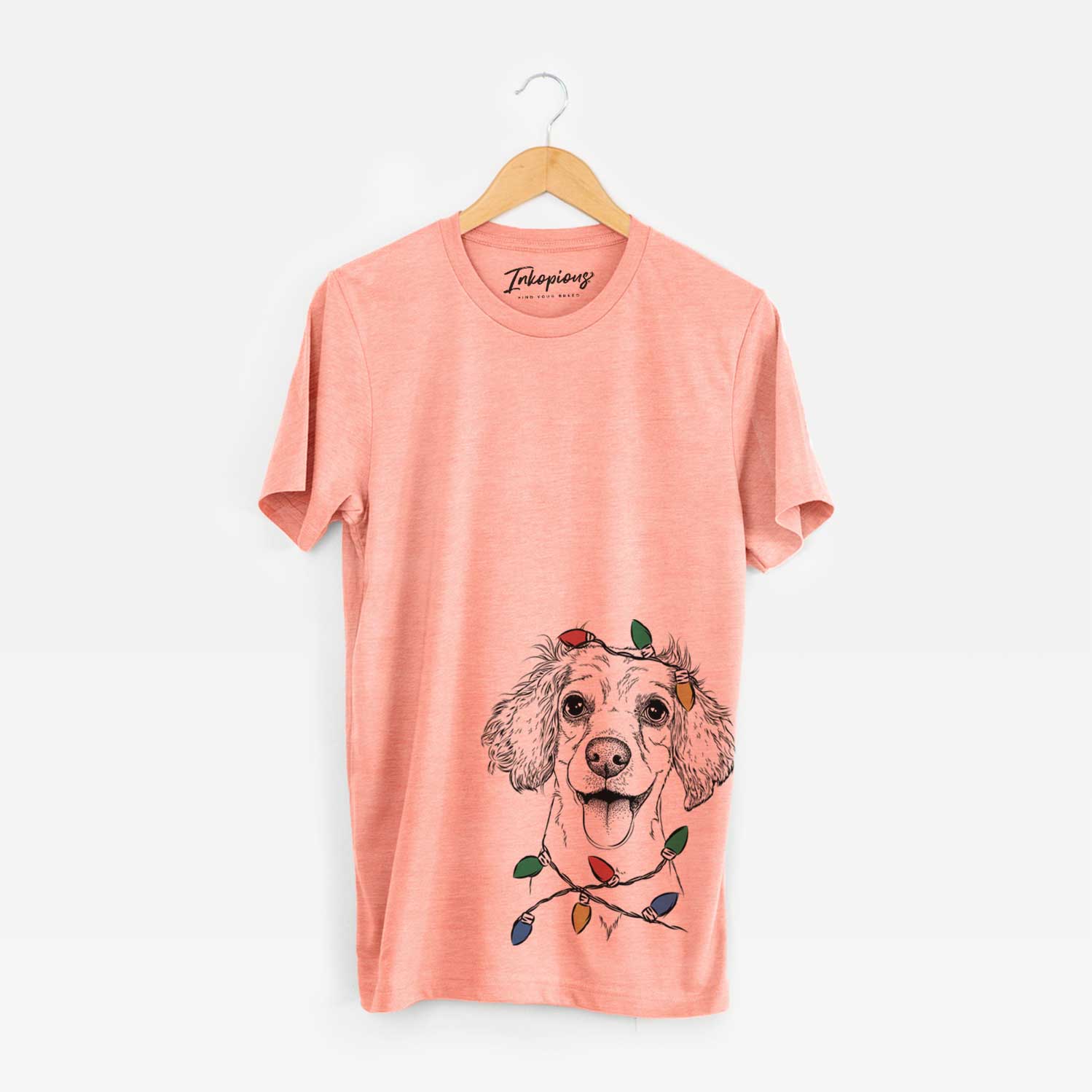 Hand-drawn sketch of Piglet the Dachshund Mix wrapped in Christmas lights on a Sunset Unisex crewneck