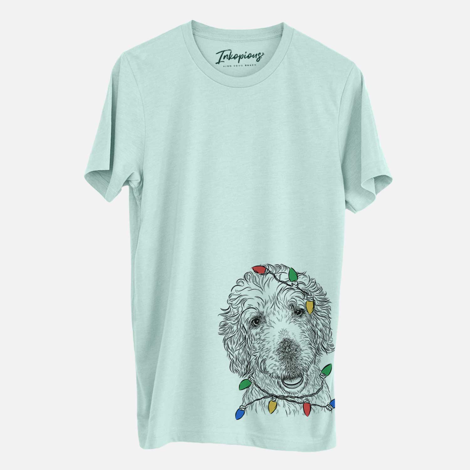 Hand-drawn sketch of Preston the Labradoodle wrapped in Christmas lights on a Heather Sage Unisex crewneck