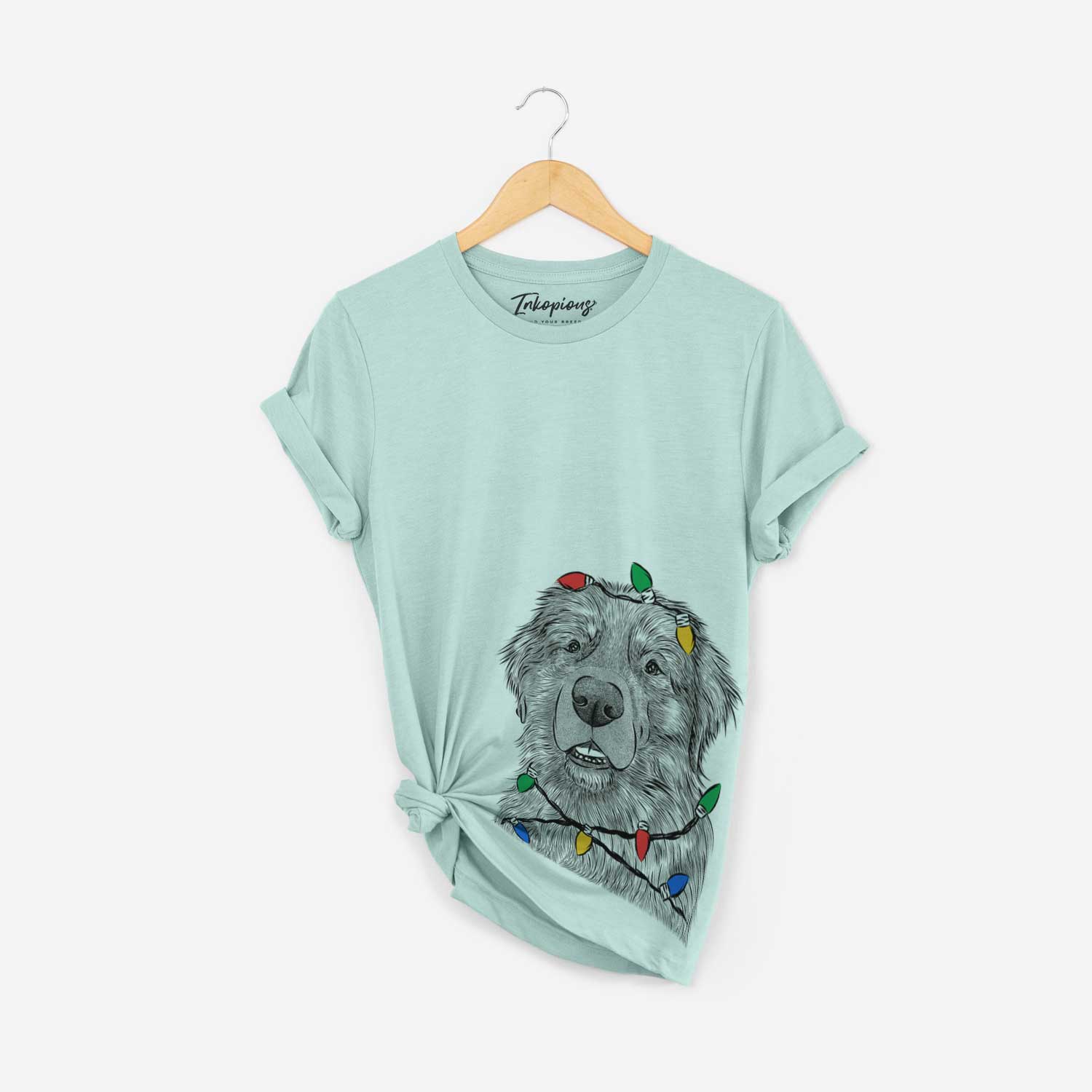 Hand-drawn sketch of Ralph the Leonberger wrapped in Christmas lights on a Heather Sage Unisex crewneck