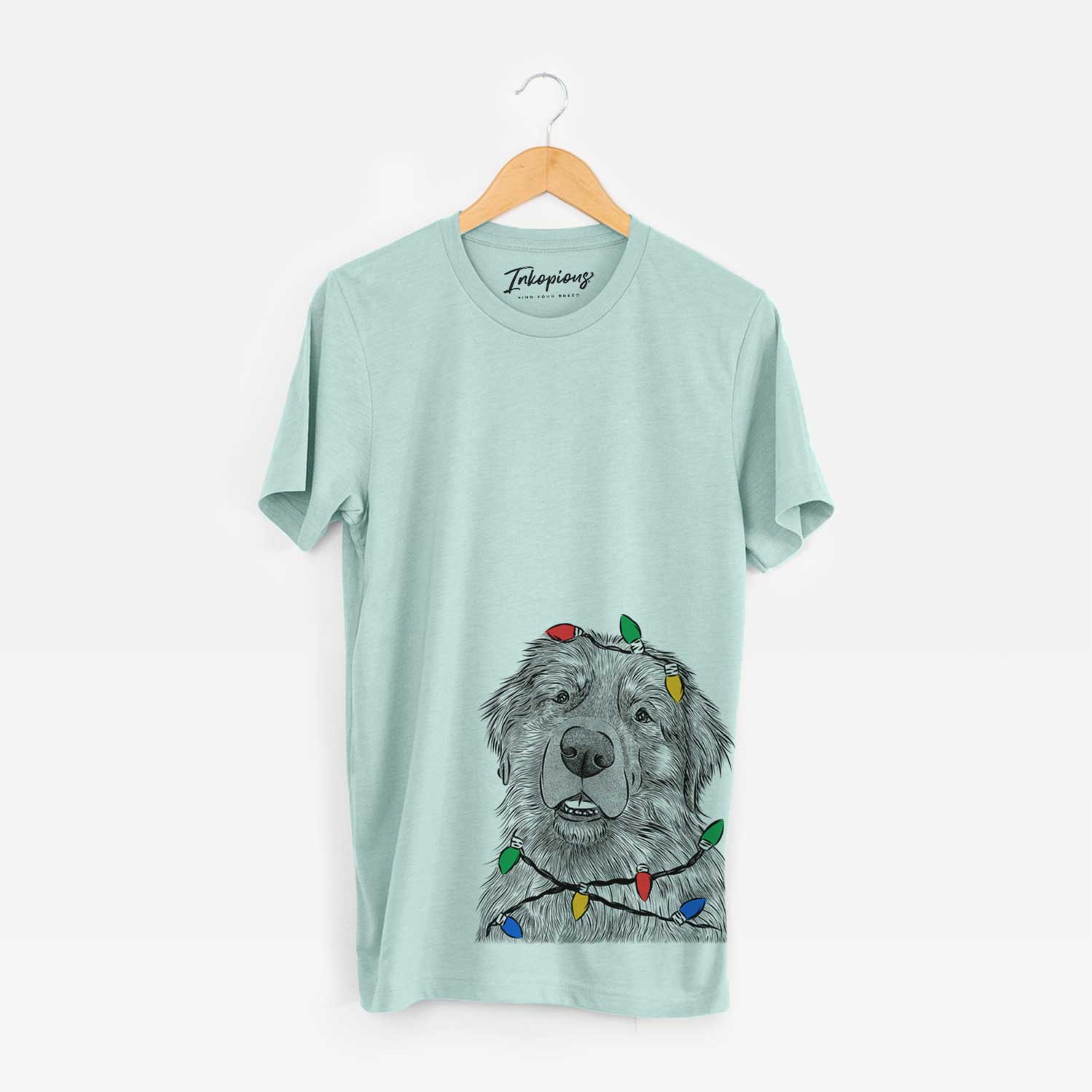 Hand-drawn sketch of Ralph the Leonberger wrapped in Christmas lights on a Heather Sage Unisex crewneck