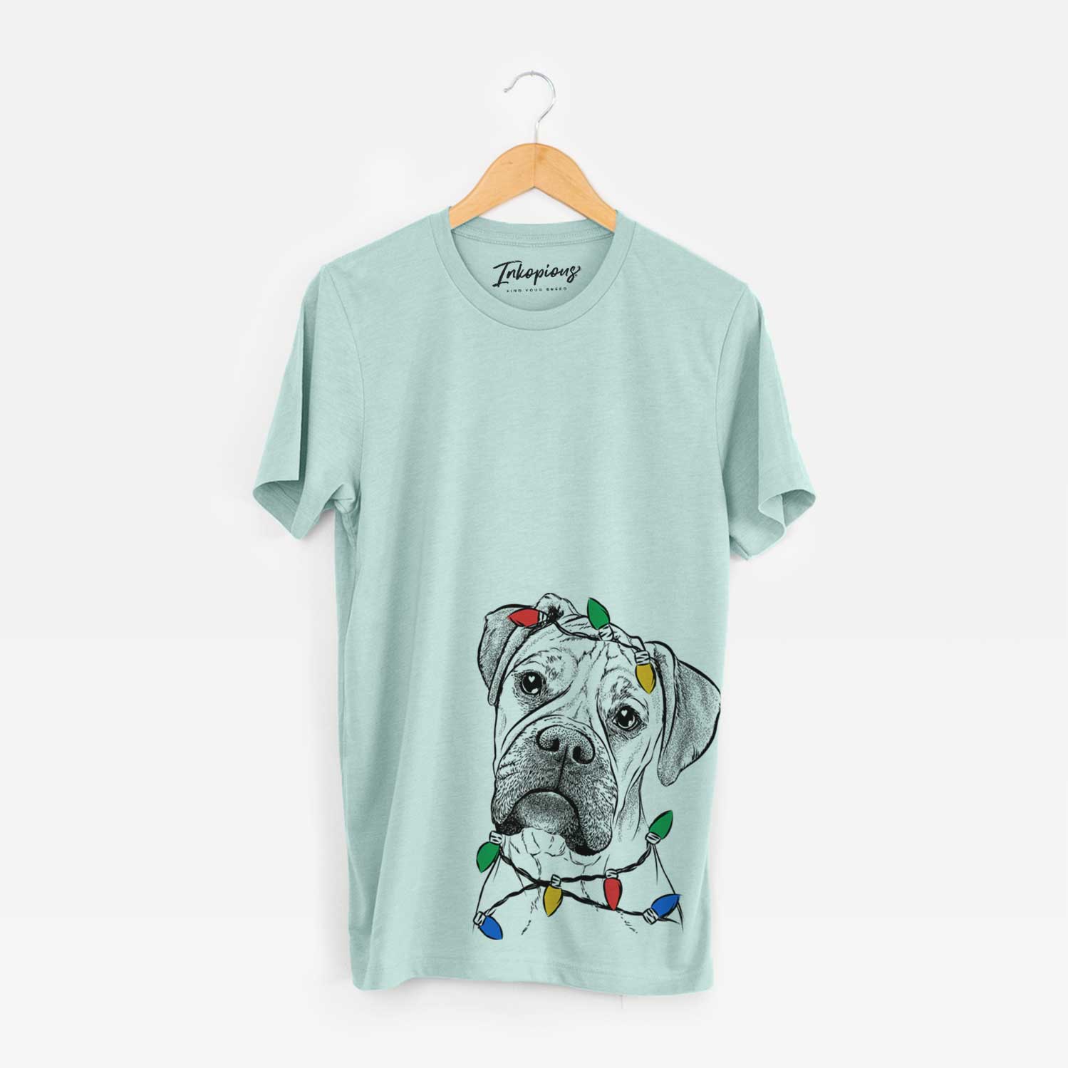 Hand-drawn sketch of Reuby the Boxer wrapped in Christmas lights on a Heather Sage Unisex crewneck