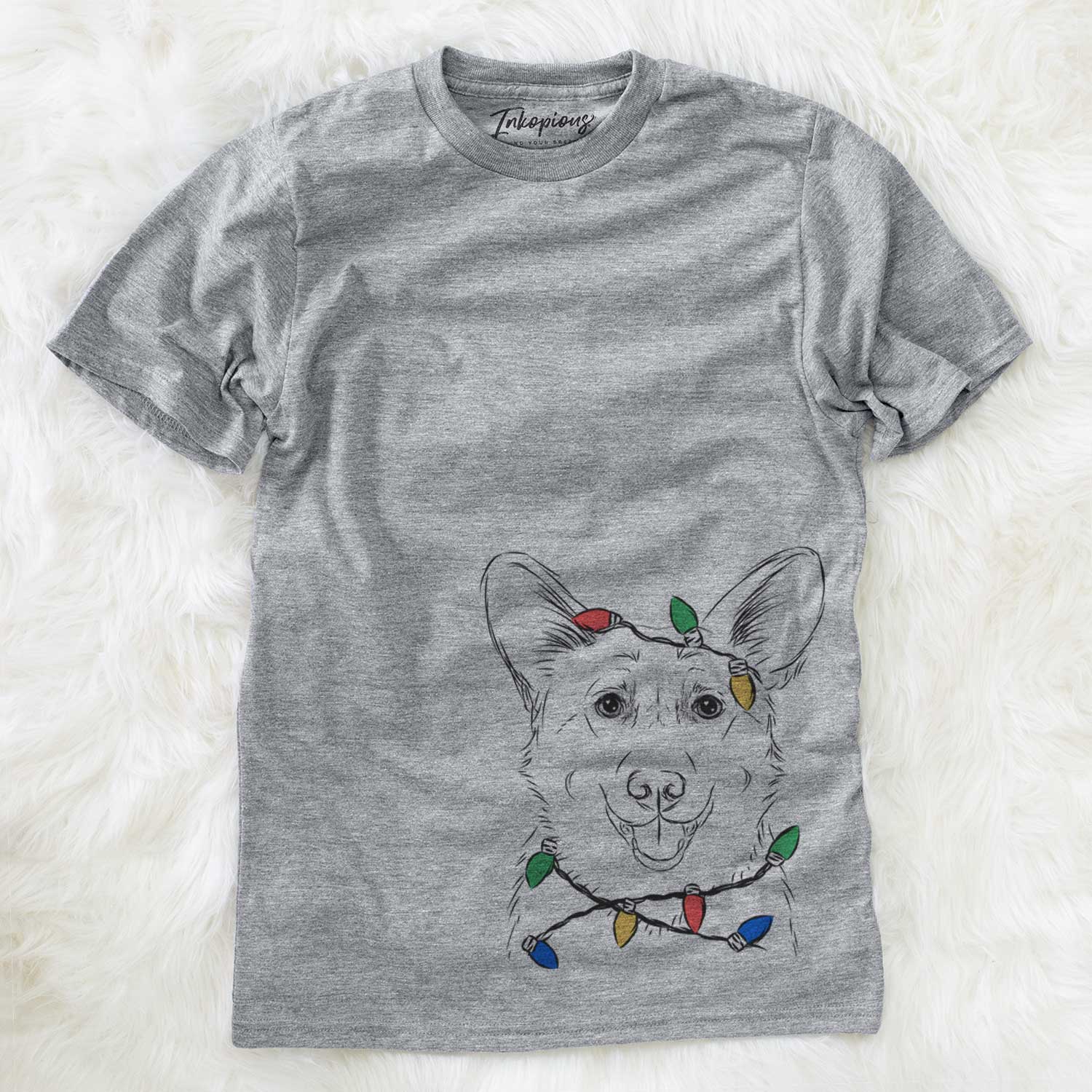 Hand-drawn sketch of Ricco the Corgi wrapped in Christmas lights on a Grey Unisex crewneck
