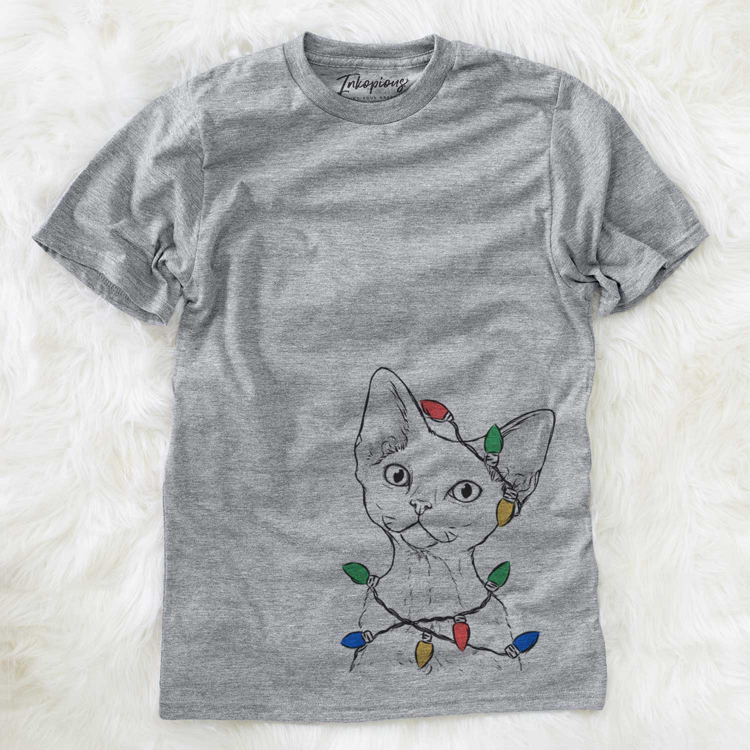 Hand-drawn sketch of Ripley the Devon Rex Cat wrapped in Christmas lights on a Grey Unisex crewneck