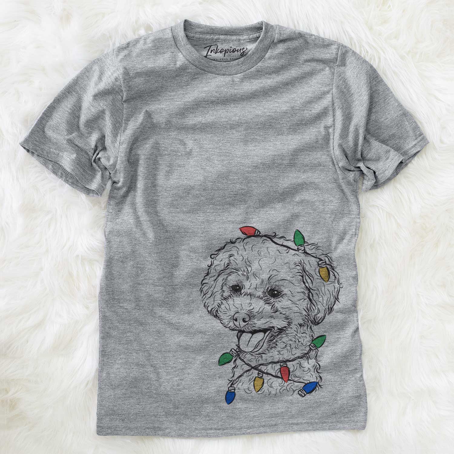 Hand-drawn sketch of Rocky the Teacup Poodle wrapped in Christmas lights on a Grey Unisex crewneck