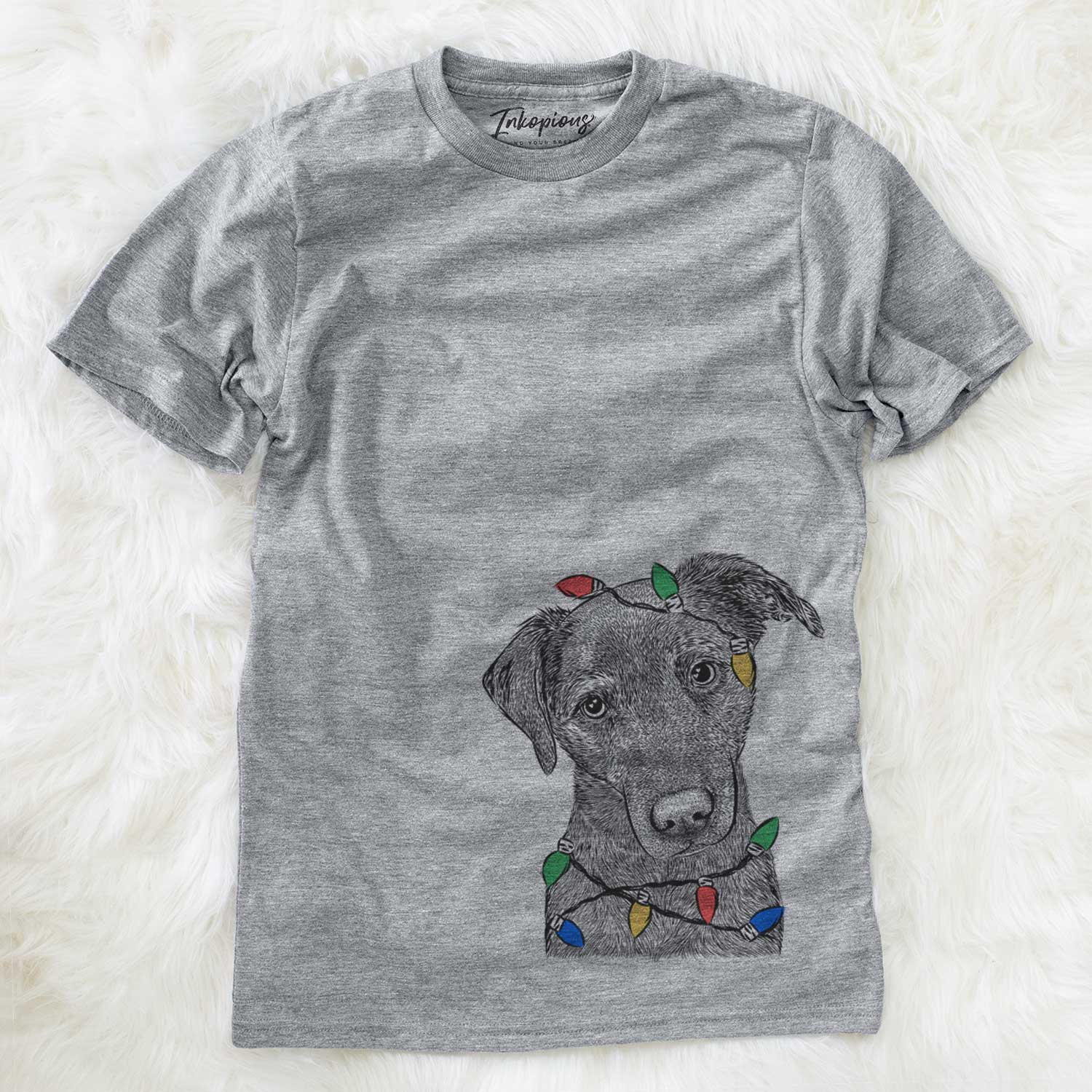 Hand-drawn sketch of Sadie the Whipador wrapped in Christmas lights on a Grey Unisex crewneck