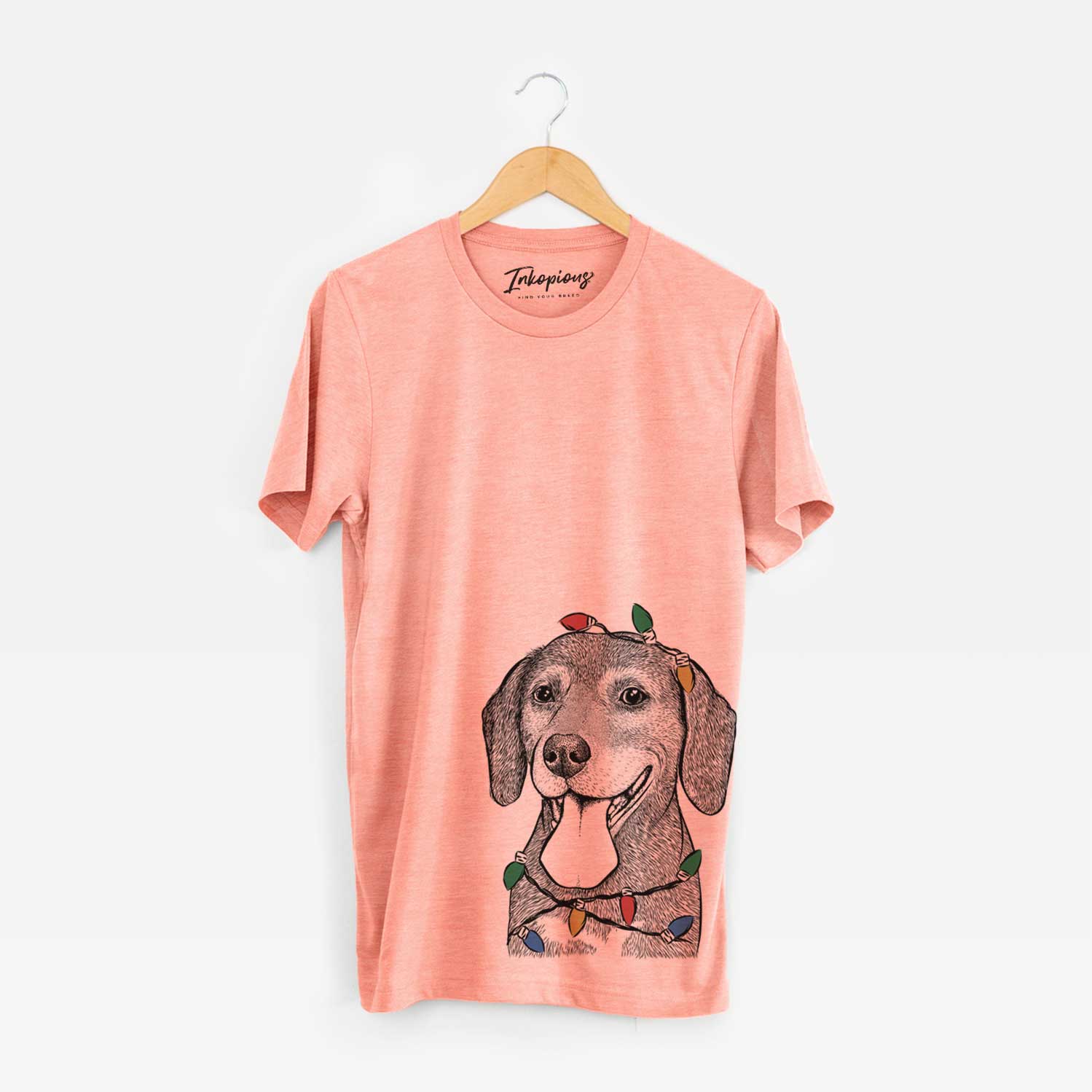 Hand-drawn sketch of Scarlett the Beagle wrapped in Christmas lights on a Sunset Unisex crewneck