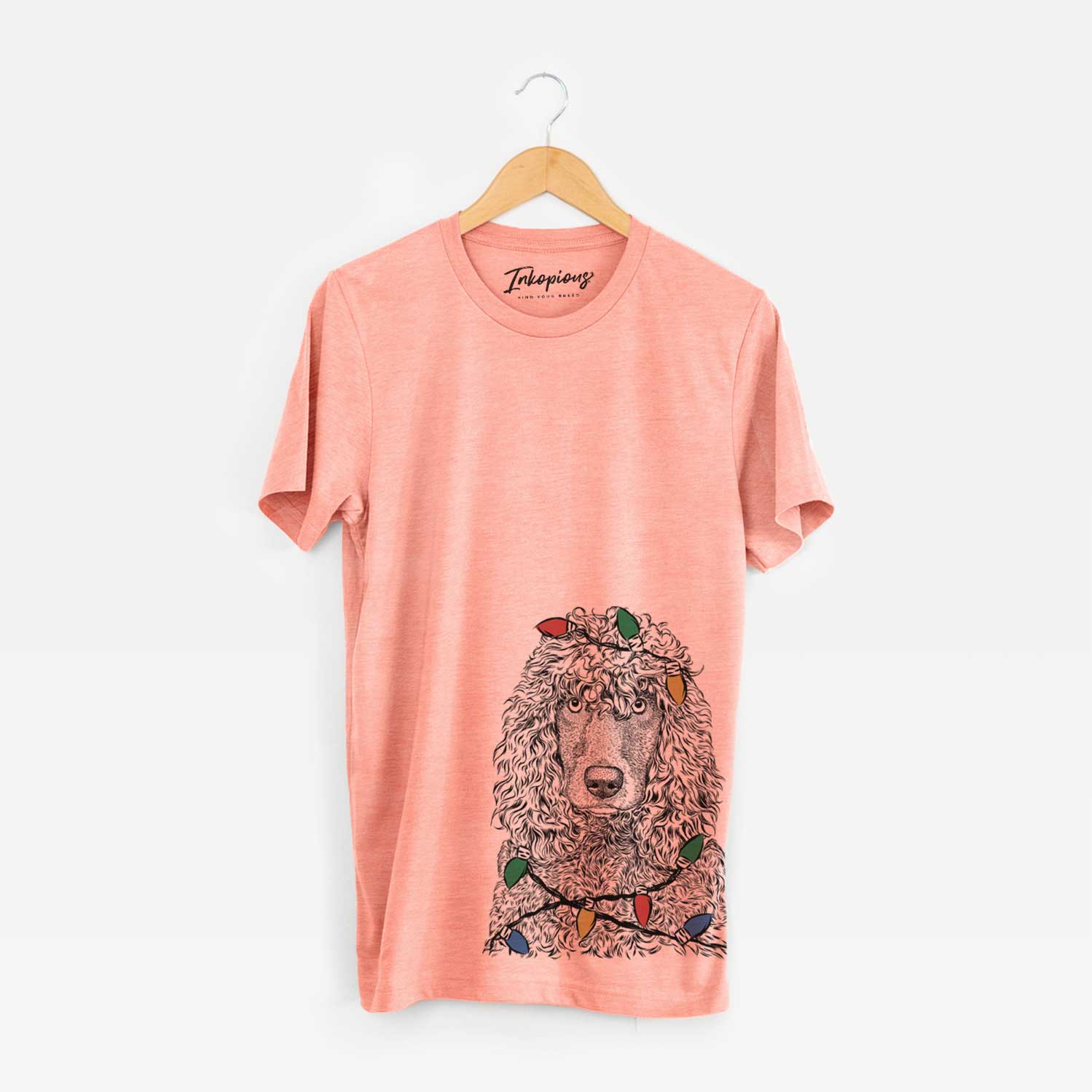 Hand-drawn sketch of Shilo the Irish Water Spaniel wrapped in Christmas lights on a Sunset Unisex crewneck