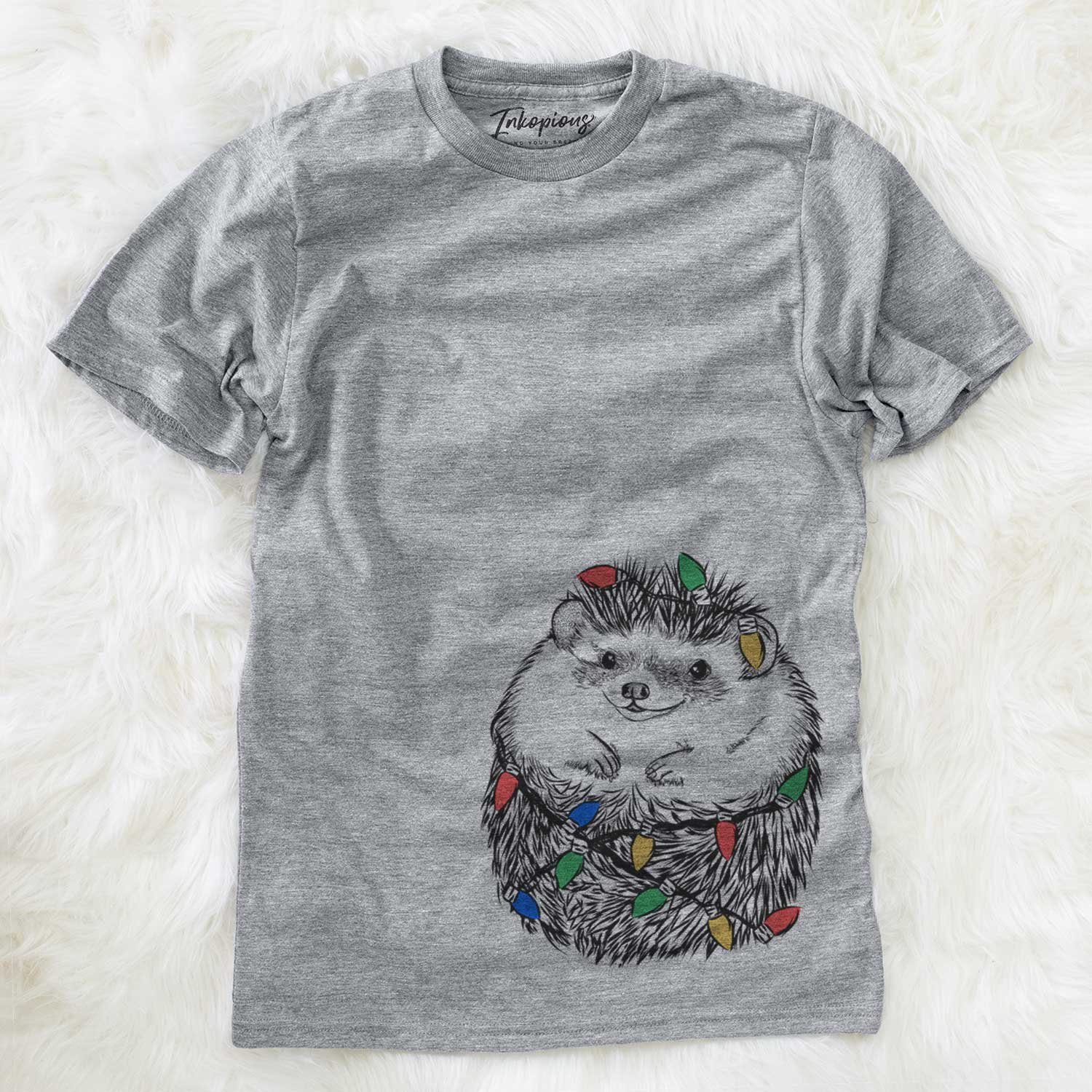 Hand-drawn sketch of Sid the Hedgehog wrapped in Christmas lights on a Grey Unisex crewneck