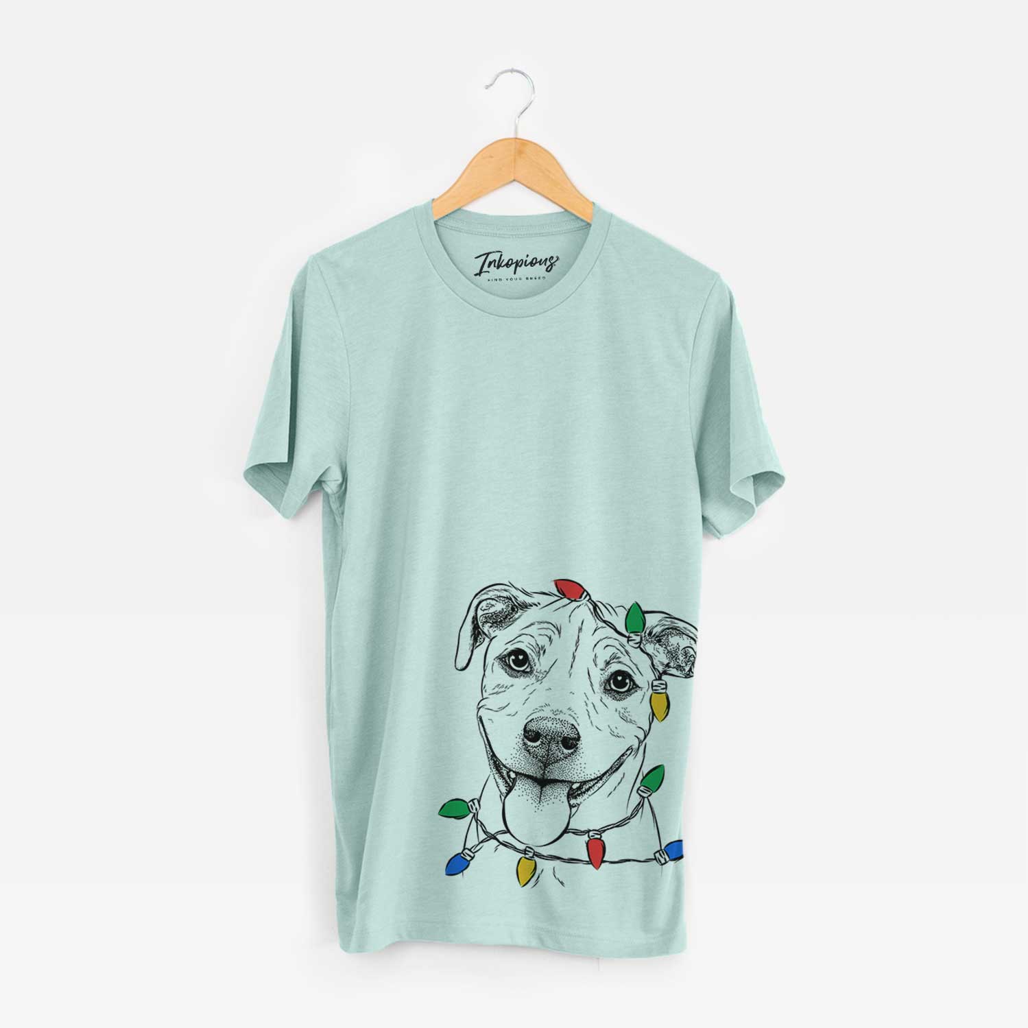 Hand-drawn sketch of Skye the Pitweiler wrapped in Christmas lights on a Heather Sage Unisex crewneck