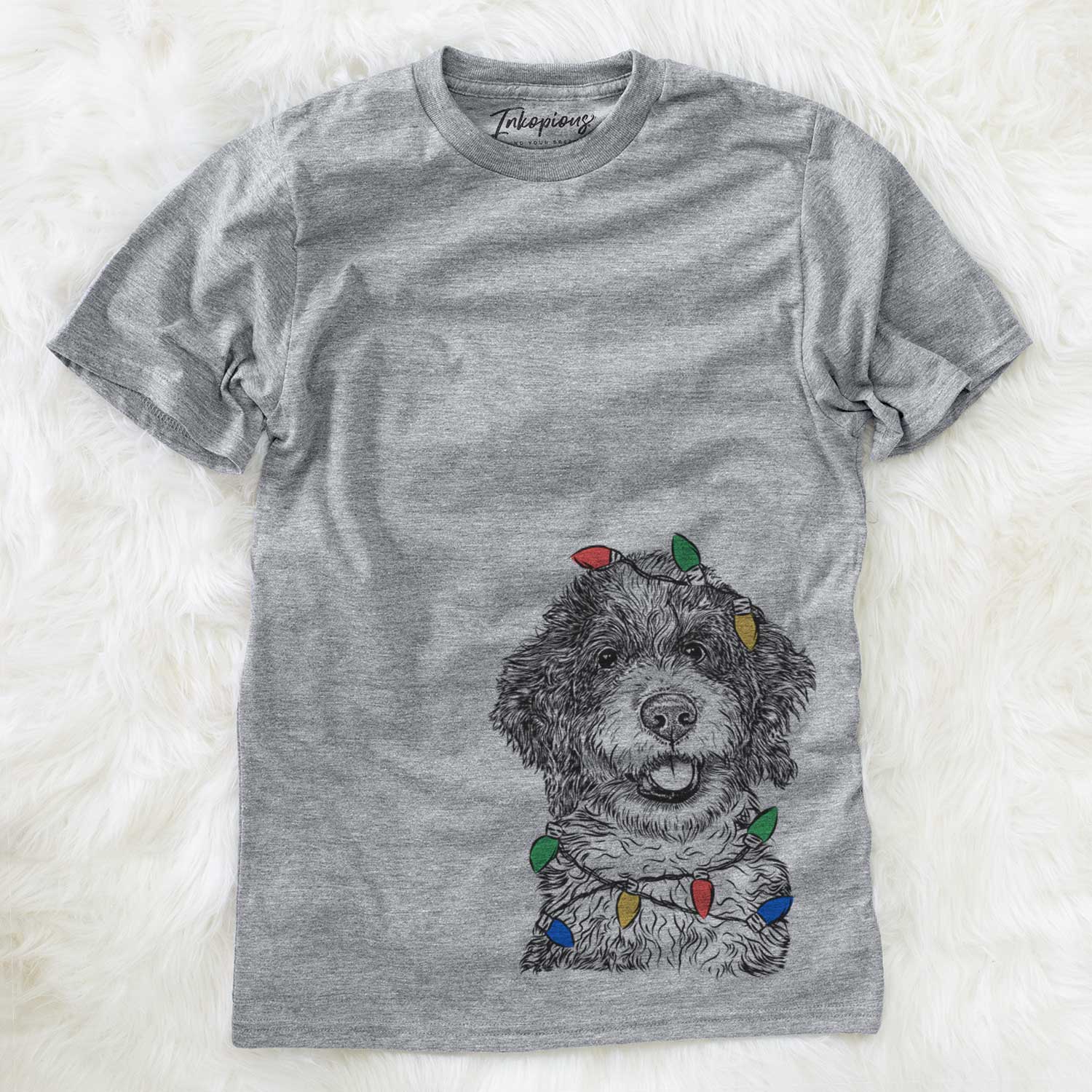 Hand-drawn sketch of Smoky the Bernedoodle Puppy wrapped in Christmas lights on a Grey Unisex crewneck