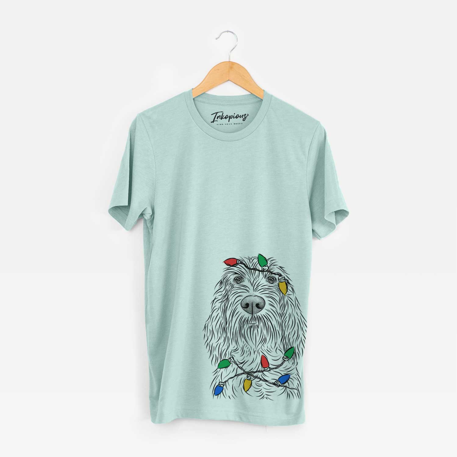 Hand-drawn sketch of Stefano the Spinone Italiano wrapped in Christmas lights on a Heather Sage Unisex crewneck