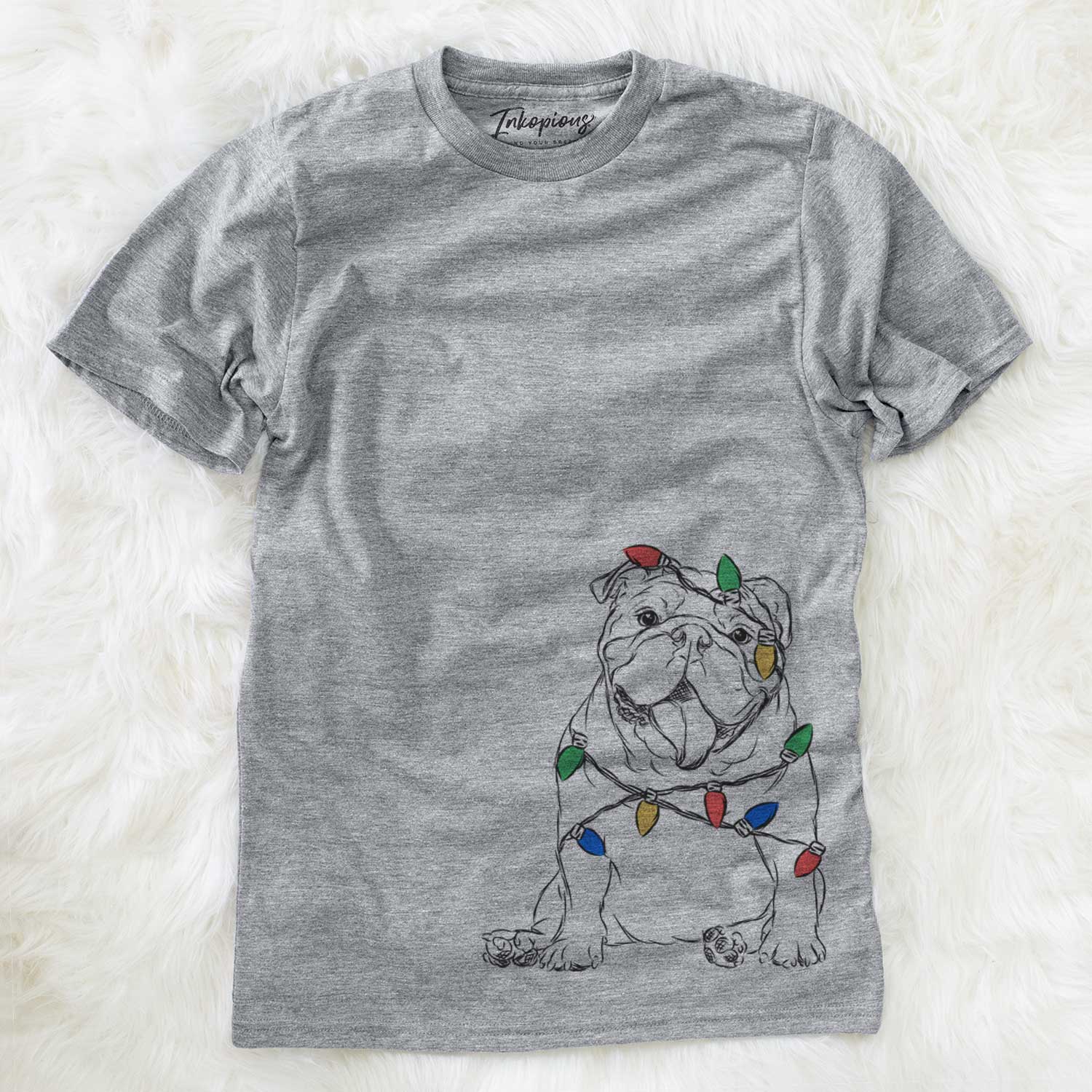 Hand-drawn sketch of Tank the English Bulldog wrapped in Christmas lights on a Grey Unisex crewneck