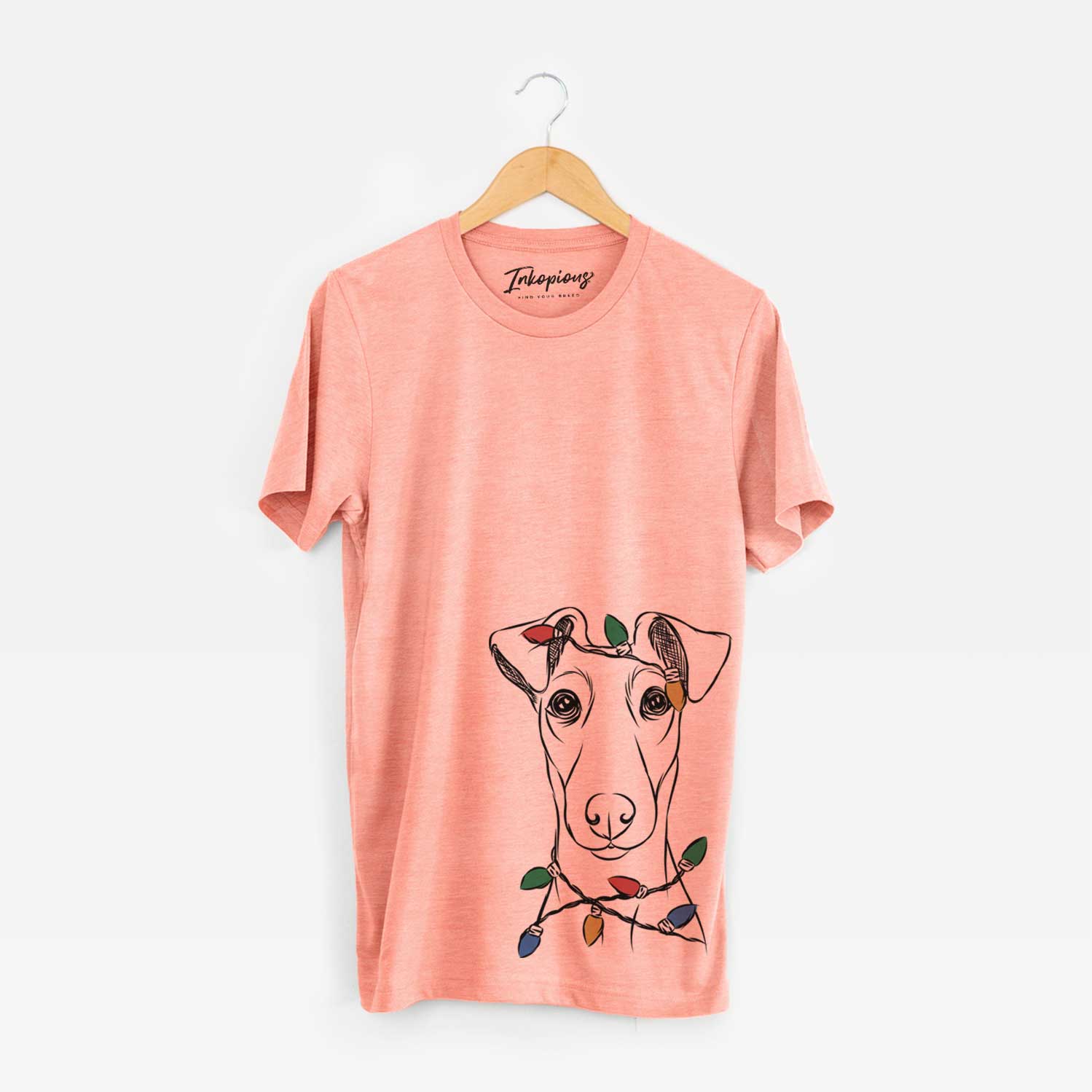 Hand-drawn sketch of Tanner the Fox Terrier wrapped in Christmas lights on a Sunset Unisex crewneck