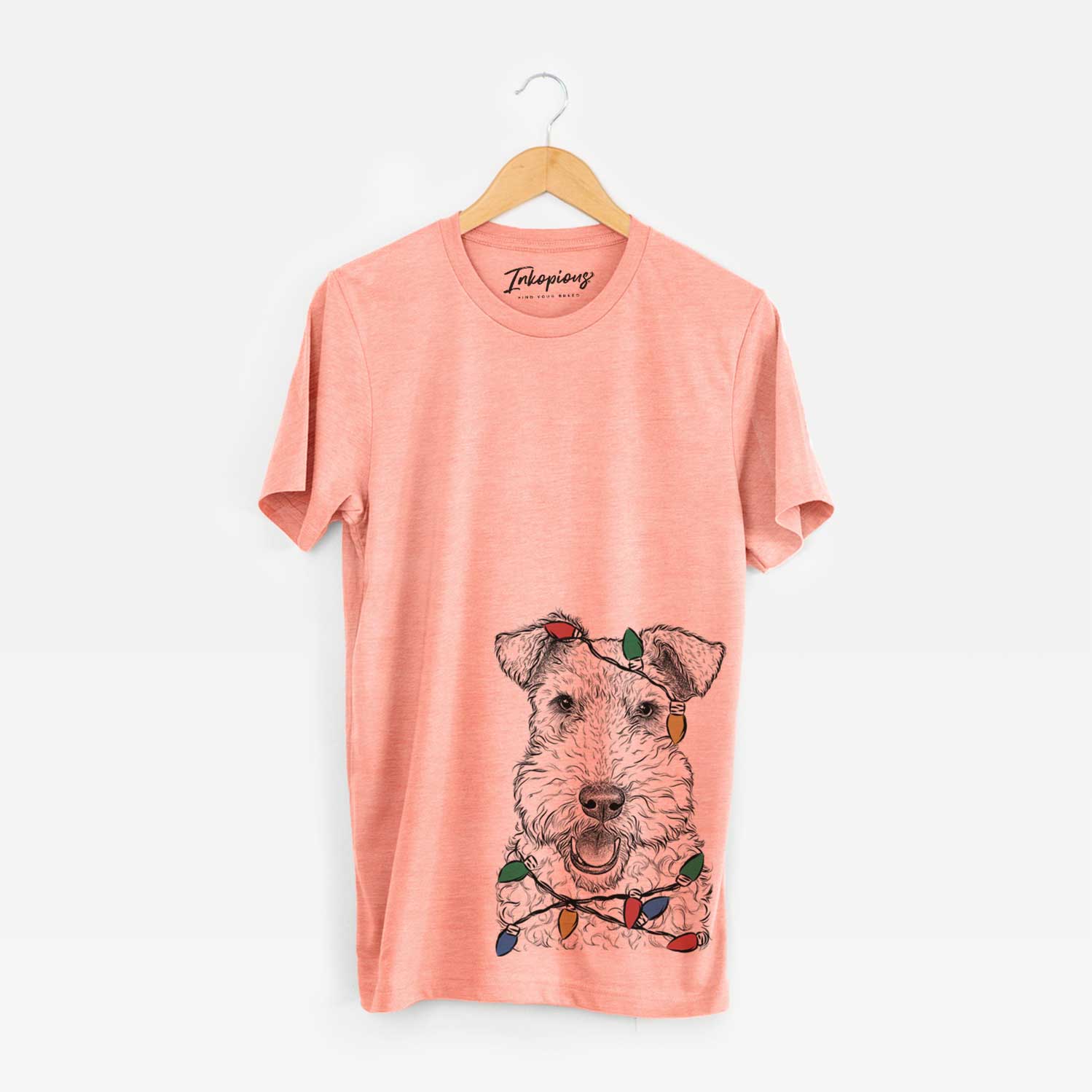 Hand-drawn sketch of Ted the Wire Fox Terrier wrapped in Christmas lights on a Sunset Unisex crewneck