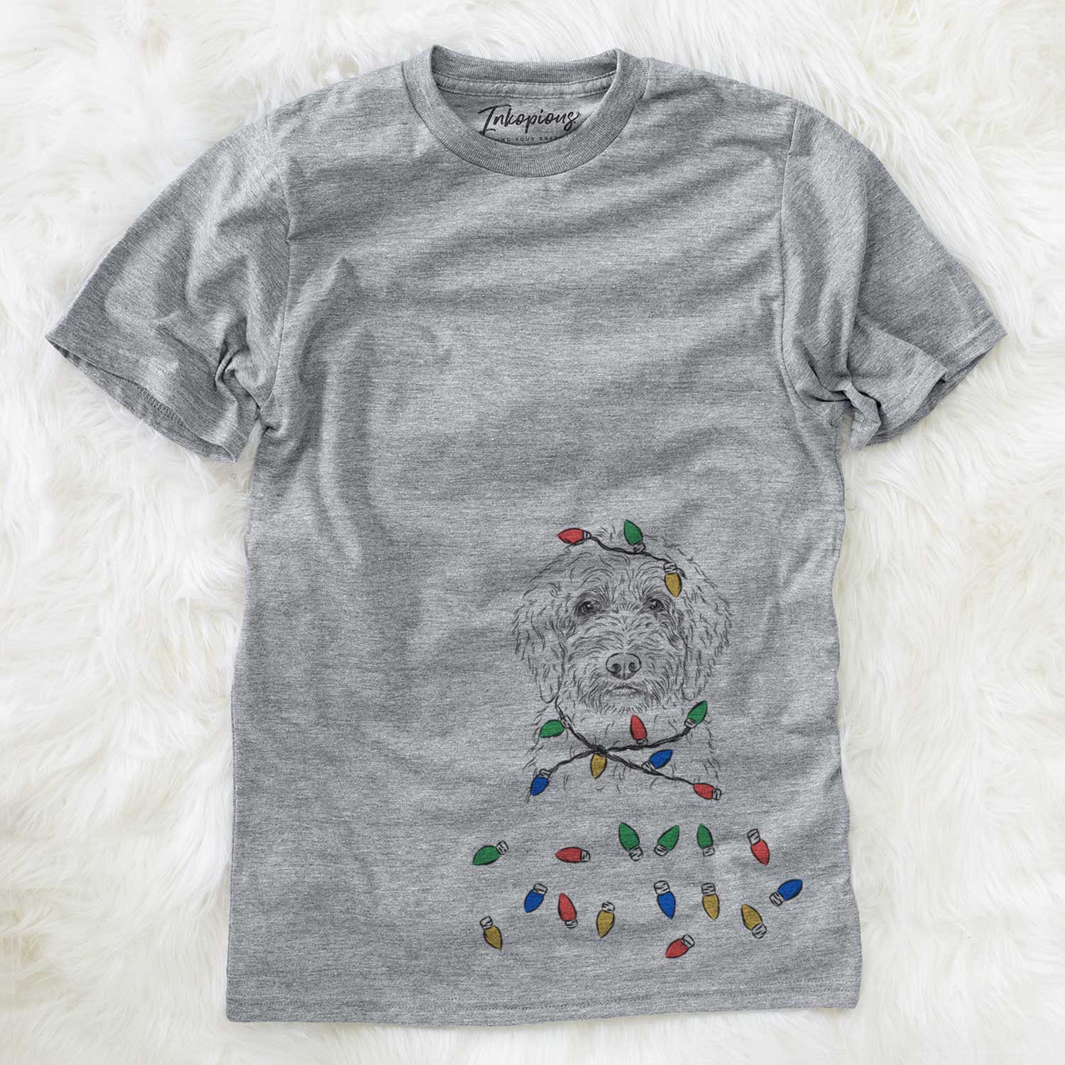 Hand-drawn sketch of Teddy the Labradoodle wrapped in Christmas lights on a Grey Unisex crewneck
