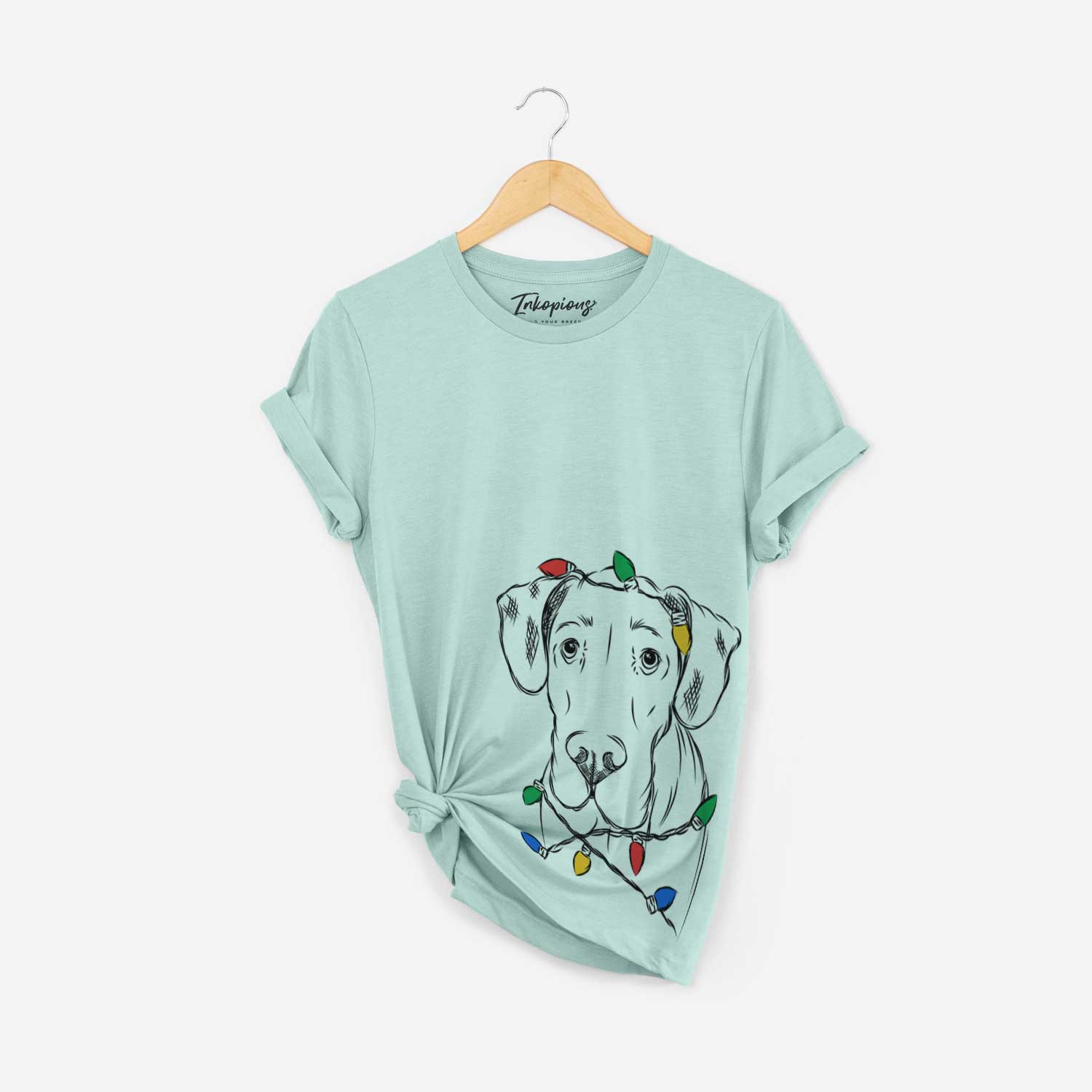 Hand-drawn sketch of Titus the Great Dane wrapped in Christmas lights on a Heather Sage Unisex crewneck