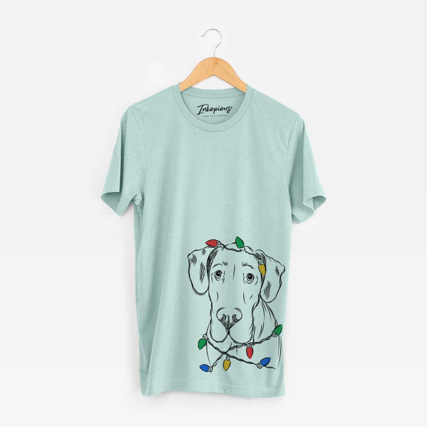 Hand-drawn sketch of Titus the Great Dane wrapped in Christmas lights on a Heather Sage Unisex crewneck