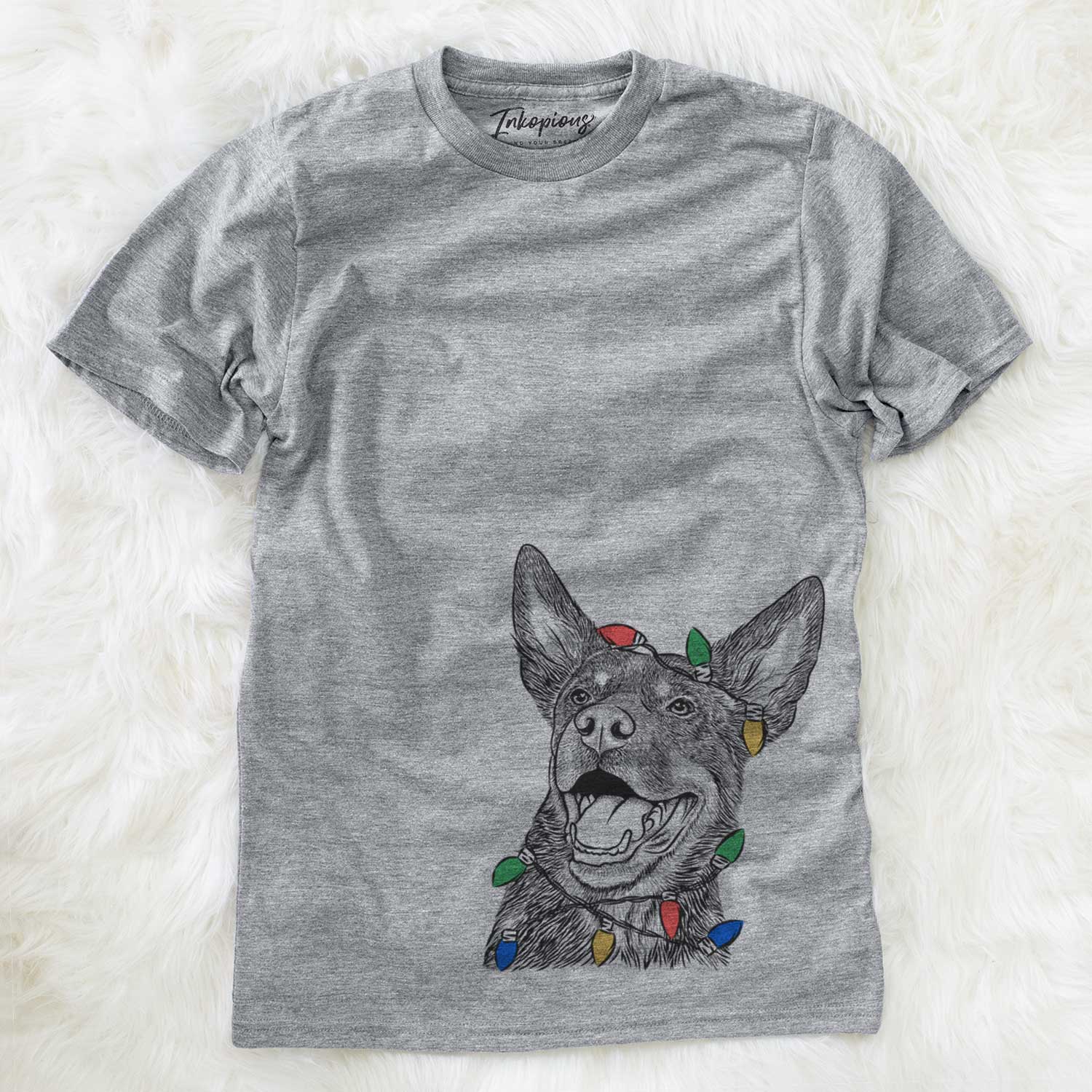 Hand-drawn sketch of Tucker the Australian Kelpie wrapped in Christmas lights on a Grey Unisex crewneck