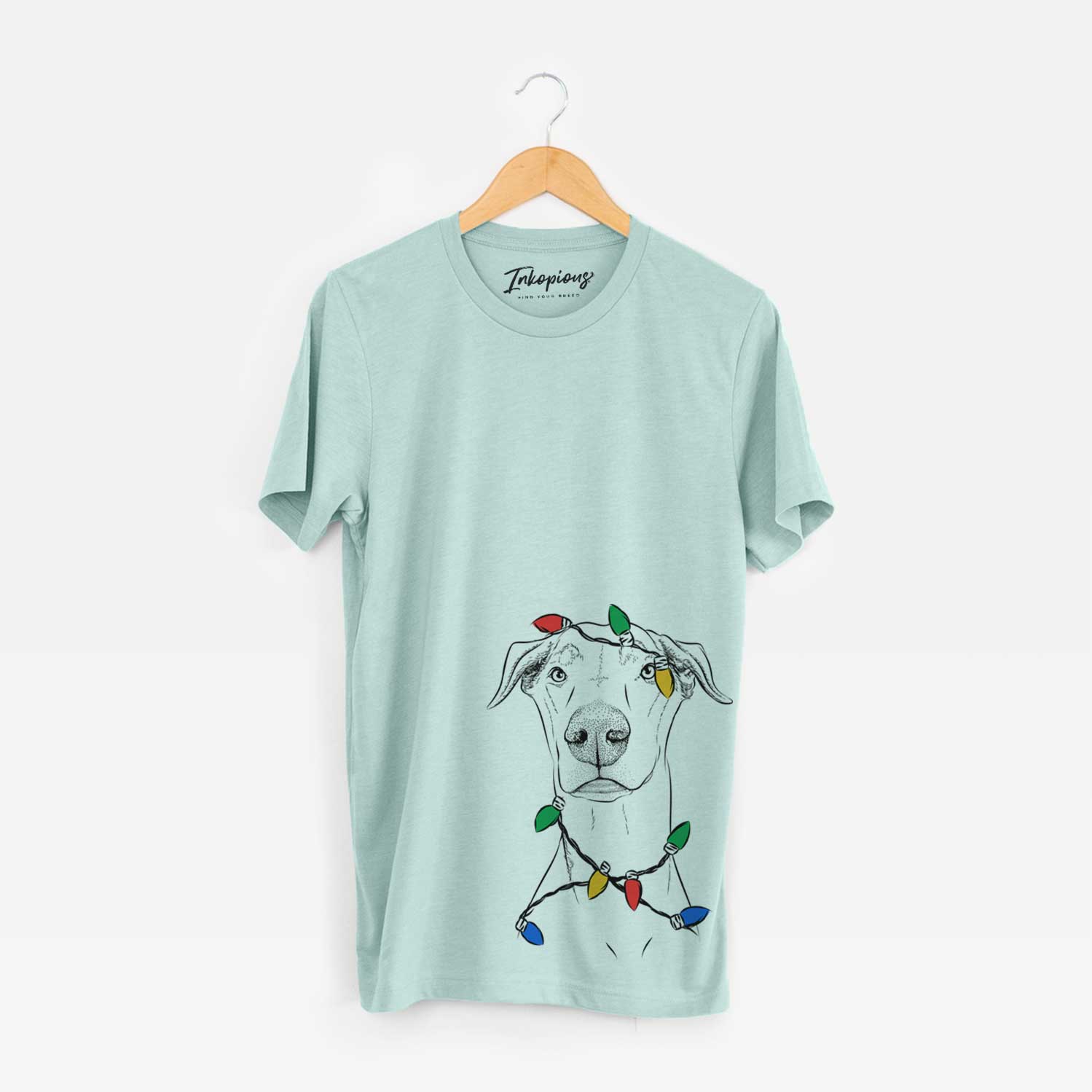 Hand-drawn sketch of Walter the White Doberman Rescue wrapped in Christmas lights on a Heather Sage Unisex crewneck