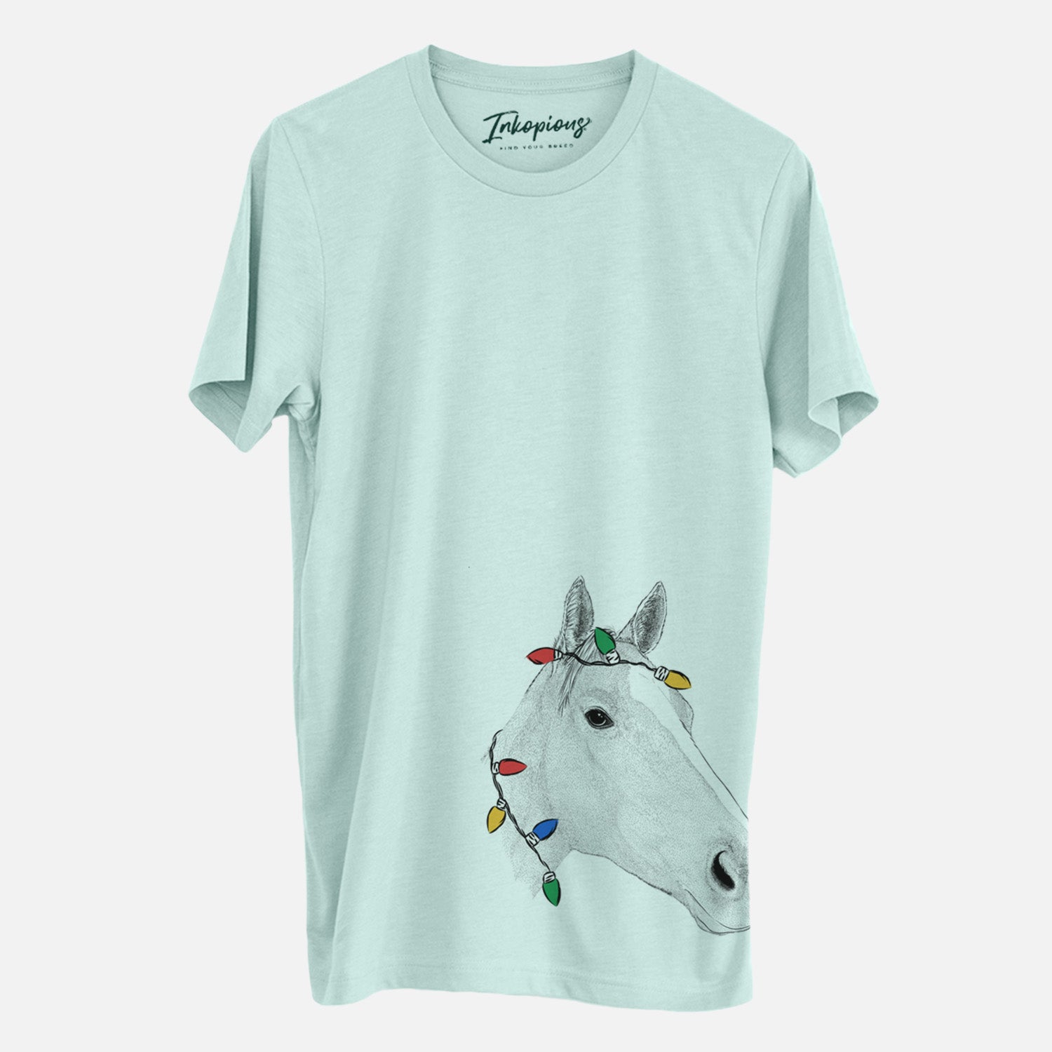 Hand-drawn sketch of Westley the Horse wrapped in Christmas lights on a Heather Sage Unisex crewneck