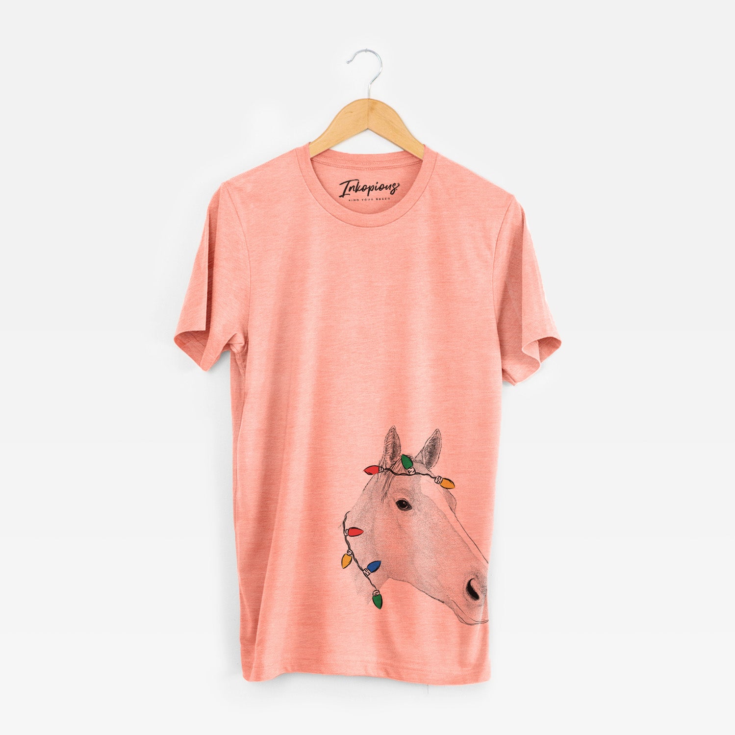Hand-drawn sketch of Westley the Horse wrapped in Christmas lights on a Sunset Unisex crewneck